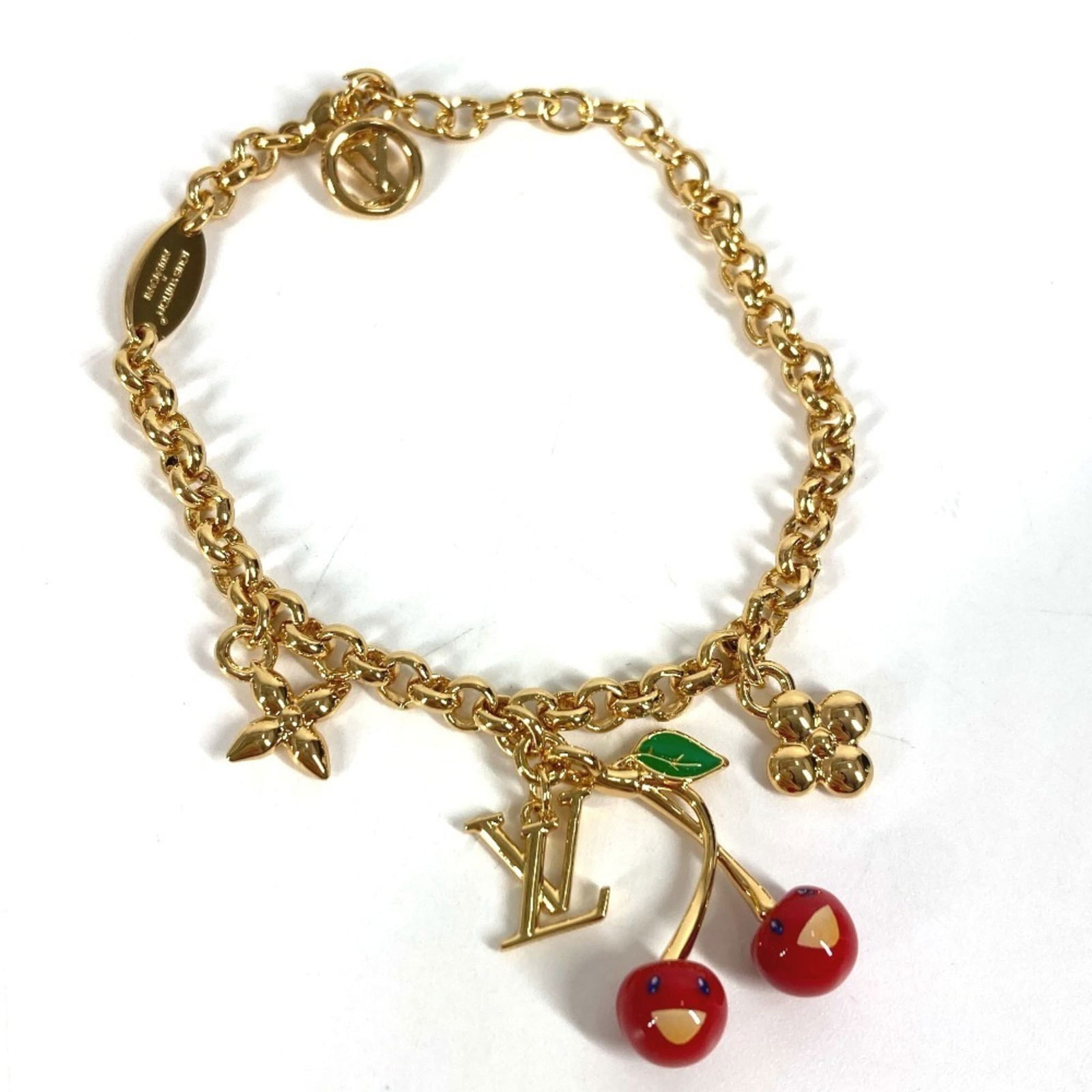 Metal Louis Vuitton Charm Bracelet: Metal Louis Vuitton Charm Bracelet This listing features Metal Louis Vuitton Charm Bracelet. Item specifics are provided below. Item Specifics: Brand: Louis Vuitton Type: Charm Bracelet Gender: