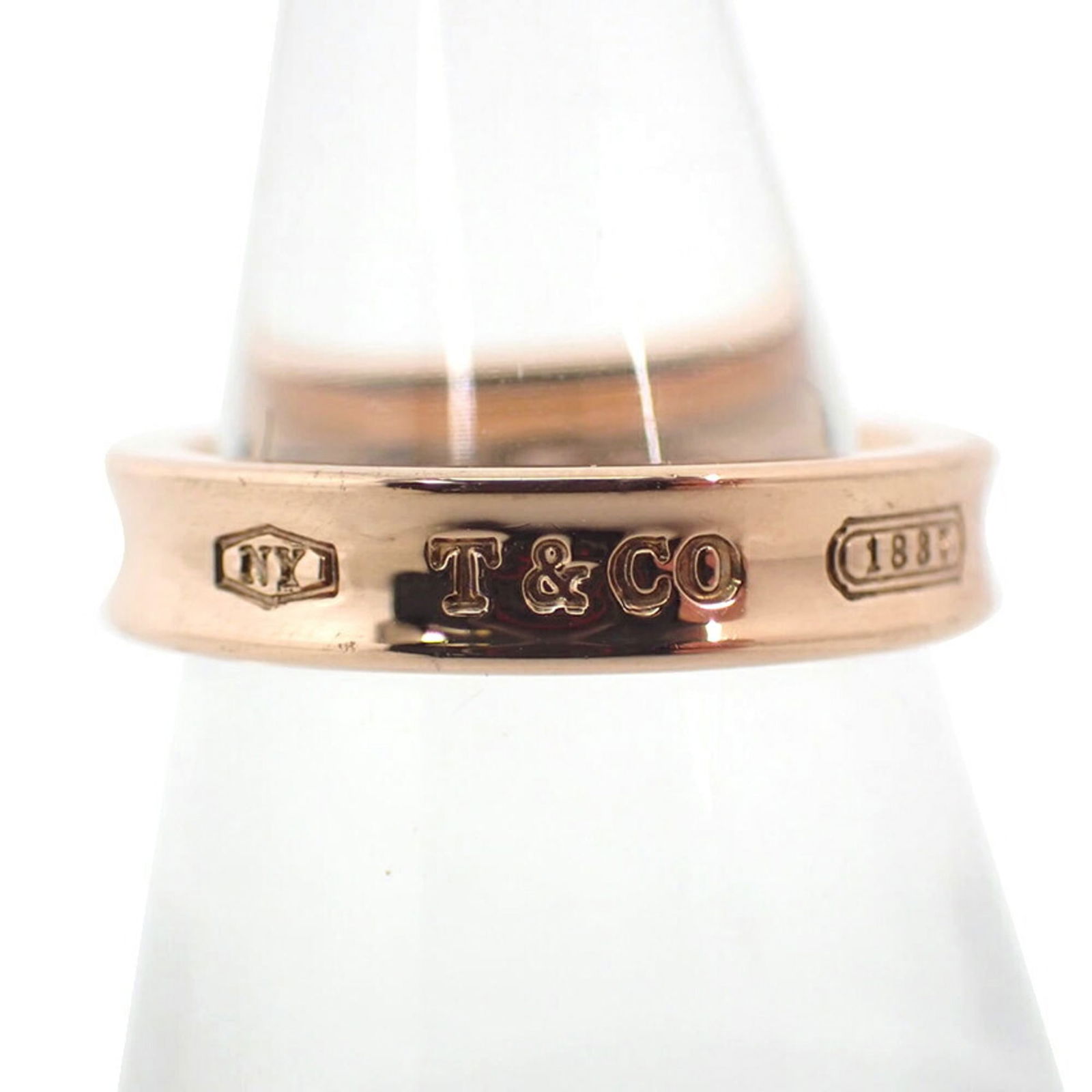 Ring Tiffany Band: Ring Tiffany Band This listing features Ring Tiffany Band. Item specifics are provided below. Item Specifics: Brand: Tiffany Type: Band Ring Gender: Women Brand Size: 47 Us Size: 4 Condition: Used