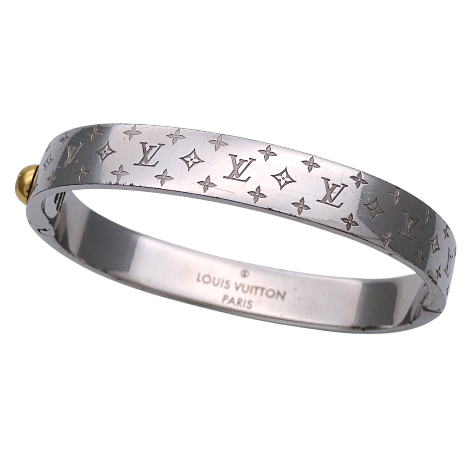 Metal Louis Vuitton Bangle: Metal Louis Vuitton Bangle This listing features Metal Louis Vuitton Bangle. Item specifics are provided below. Item Specifics: Brand: Louis Vuitton Type: Bangle Gender: Men Material: Metal Color: Sil
