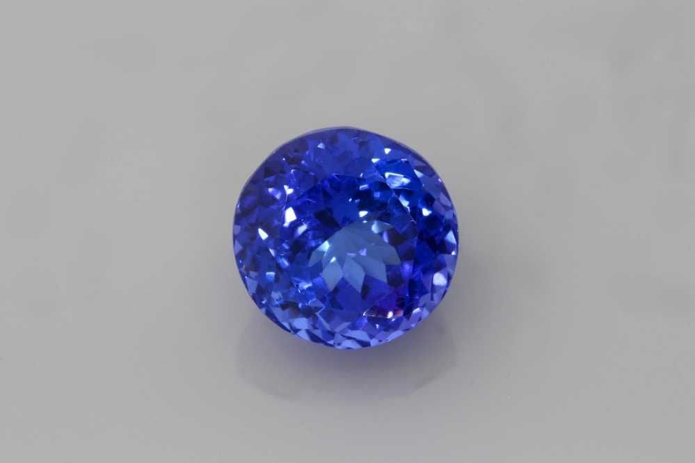 Loose Tanzanite Gemstone - Round 4.08ct Purple EC: Loose Tanzanite Gemstone - Round 4.08ct Purple EC This listing features Loose Tanzanite Gemstone - Round 4.08ct Purple EC. Item specifics are provided below. Item Specifics: Type: Tanzanite Carat: