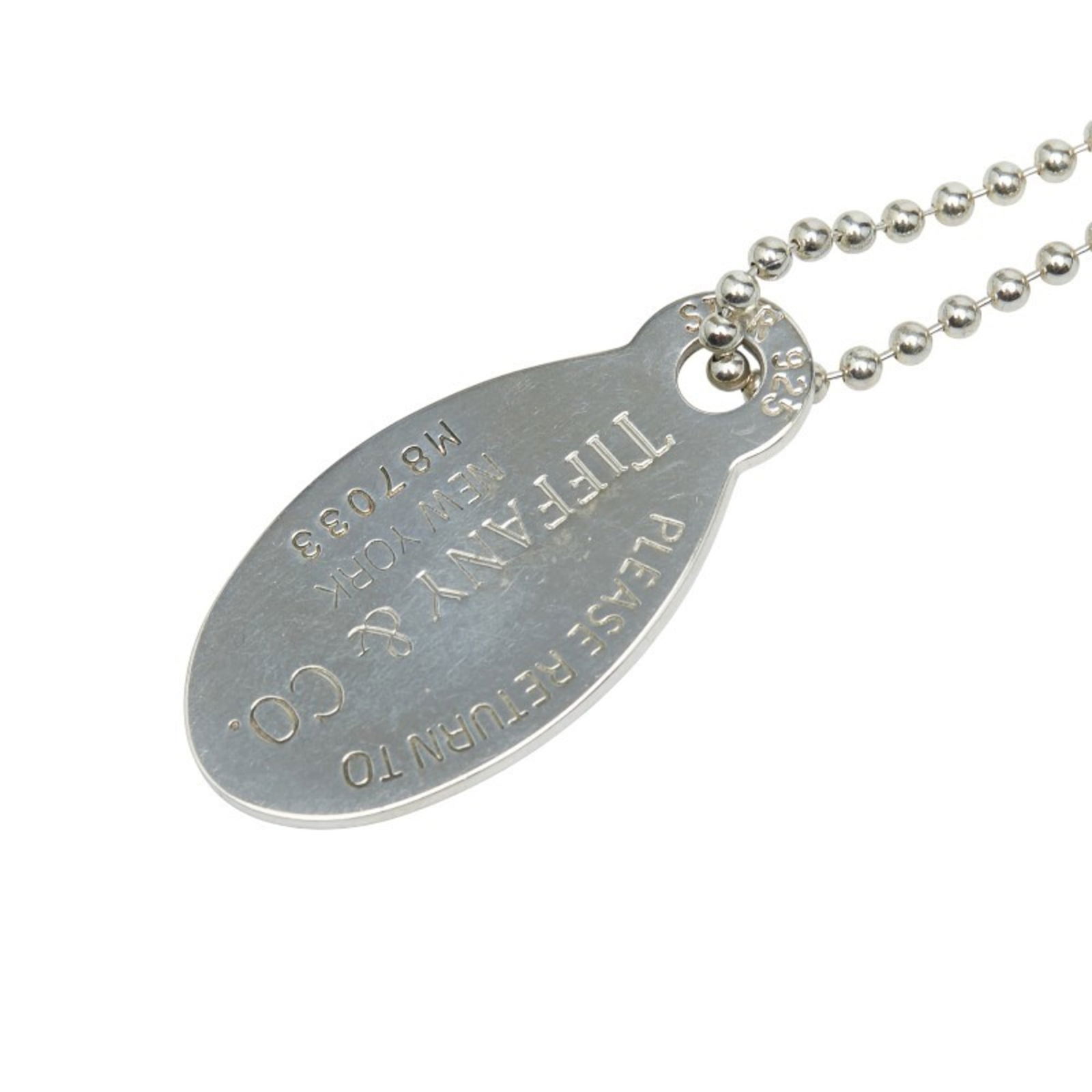 TIFFANY & Co. Return to Oval Tag Necklace in 925 Sterling Silver for Women.: TIFFANY & Co. Return to Oval Tag Necklace in 925 Sterling Silver for Women. This listing features TIFFANY & Co. Return to Oval Tag Necklace in 925 Sterling Silver for Women.. Item specifics are