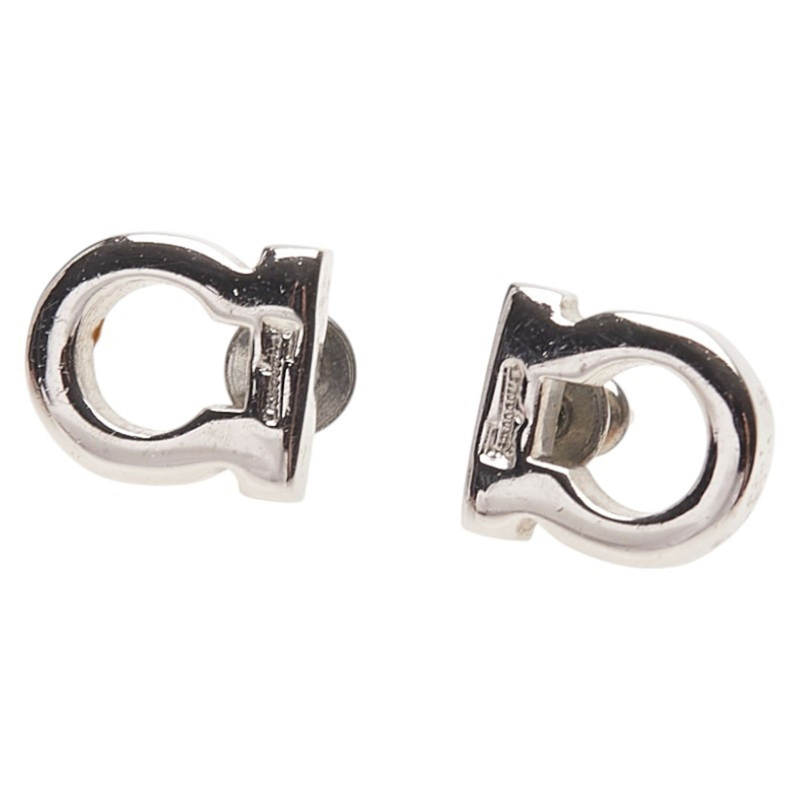 Metal Salvatore Ferragamo Stud Earrings: Metal Salvatore Ferragamo Stud Earrings This listing features Metal Salvatore Ferragamo Stud Earrings. Item specifics are provided below. Item Specifics: Brand: Salvatore Ferragamo Type: Stud