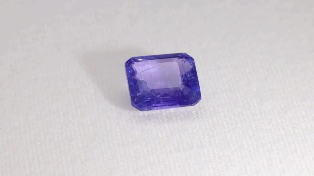 Loose Tanzanite Gemstone - IGI Square 4.85ct Violet SI: Loose Tanzanite Gemstone - IGI Square 4.85ct Violet SI This listing features Loose Tanzanite Gemstone - IGI Square 4.85ct Violet SI. Item specifics are provided below. Item Specifics: Type: