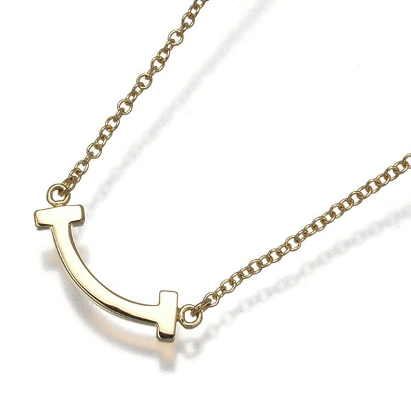 Gold Tiffany&Co. Necklace Tiffany T Smile Mini 18K 750 Yellow: Gold Tiffany&Co. Necklace Tiffany T Smile Mini 18K 750 Yellow This listing features Gold Tiffany&Co. Necklace Tiffany T Smile Mini 18K 750 Yellow. Item specifics are provided below. Item Specifics: