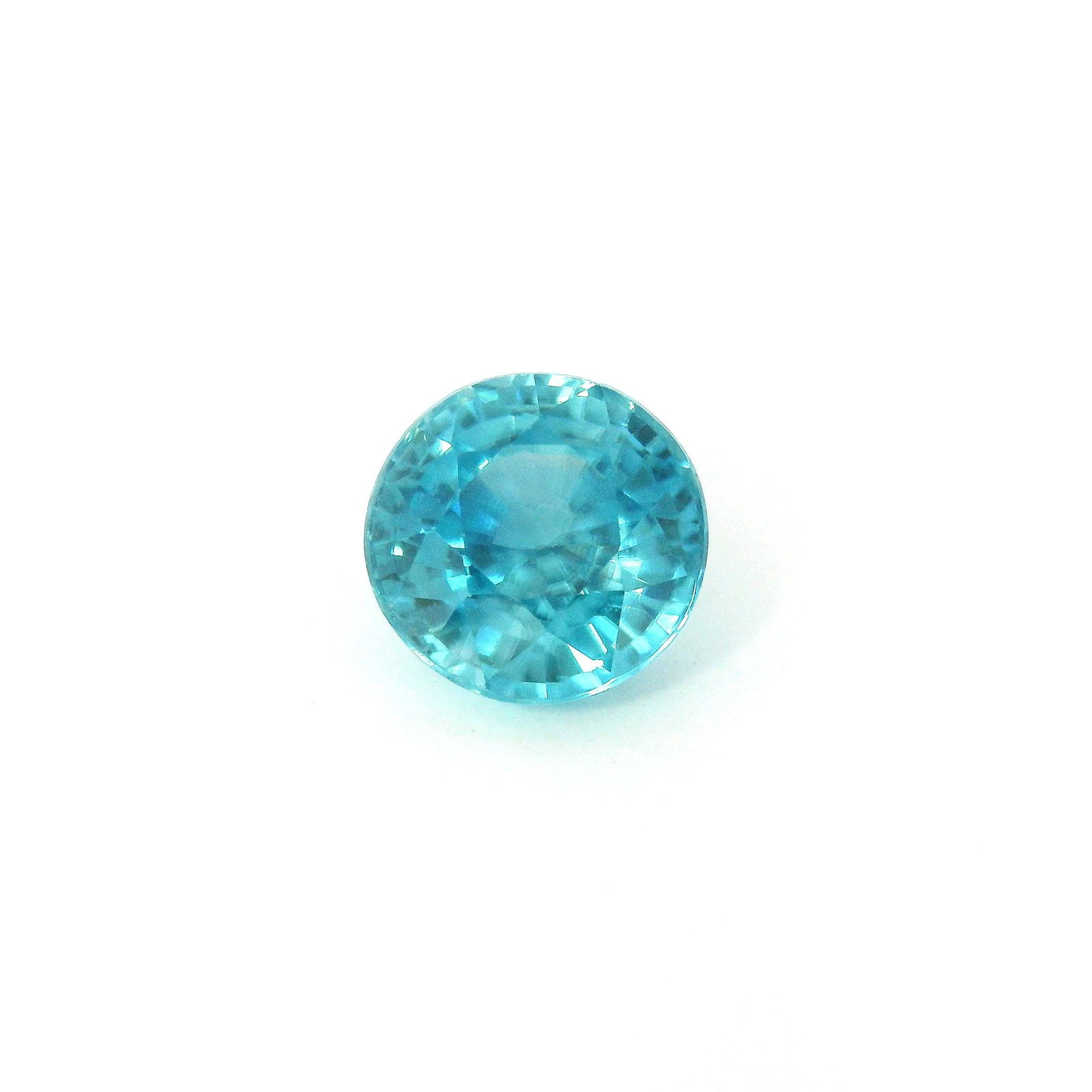 Loose Zircon Gemstone - IGI Round 3.2ct Blue EC: Loose Zircon Gemstone - IGI Round 3.2ct Blue EC This listing features Loose Zircon Gemstone - IGI Round 3.2ct Blue EC. Item specifics are provided below. Item Specifics: Type: Zircon Carat: 3.2 Cut: