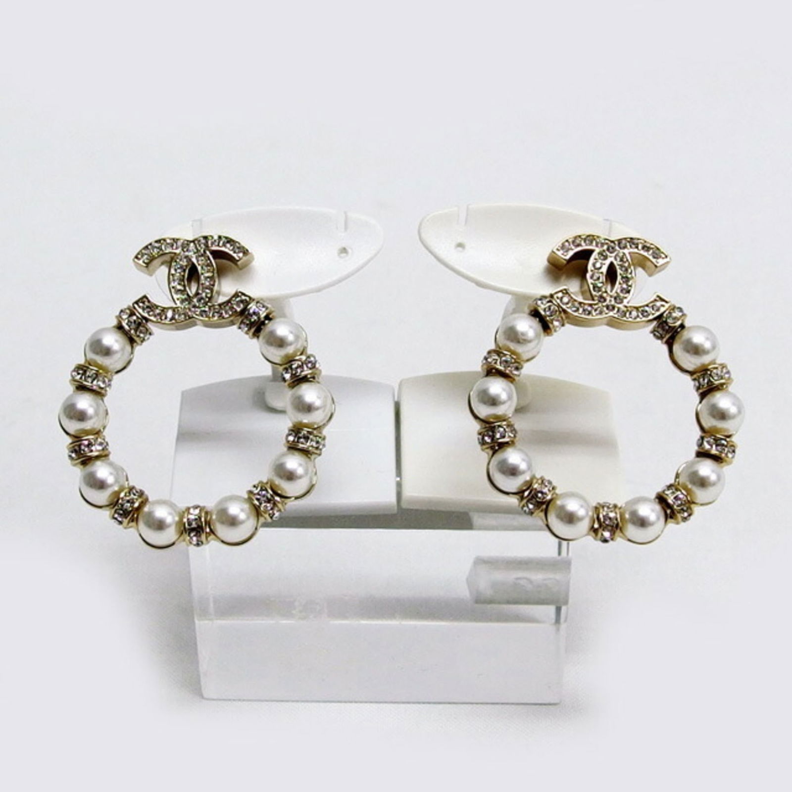 Rhinestone - Chanel Stud Earrings Metal: Rhinestone - Chanel Stud Earrings Metal This listing features Rhinestone - Chanel Stud Earrings Metal. Item specifics are provided below. Item Specifics: Brand: Chanel Type: Stud Earrings Gender: