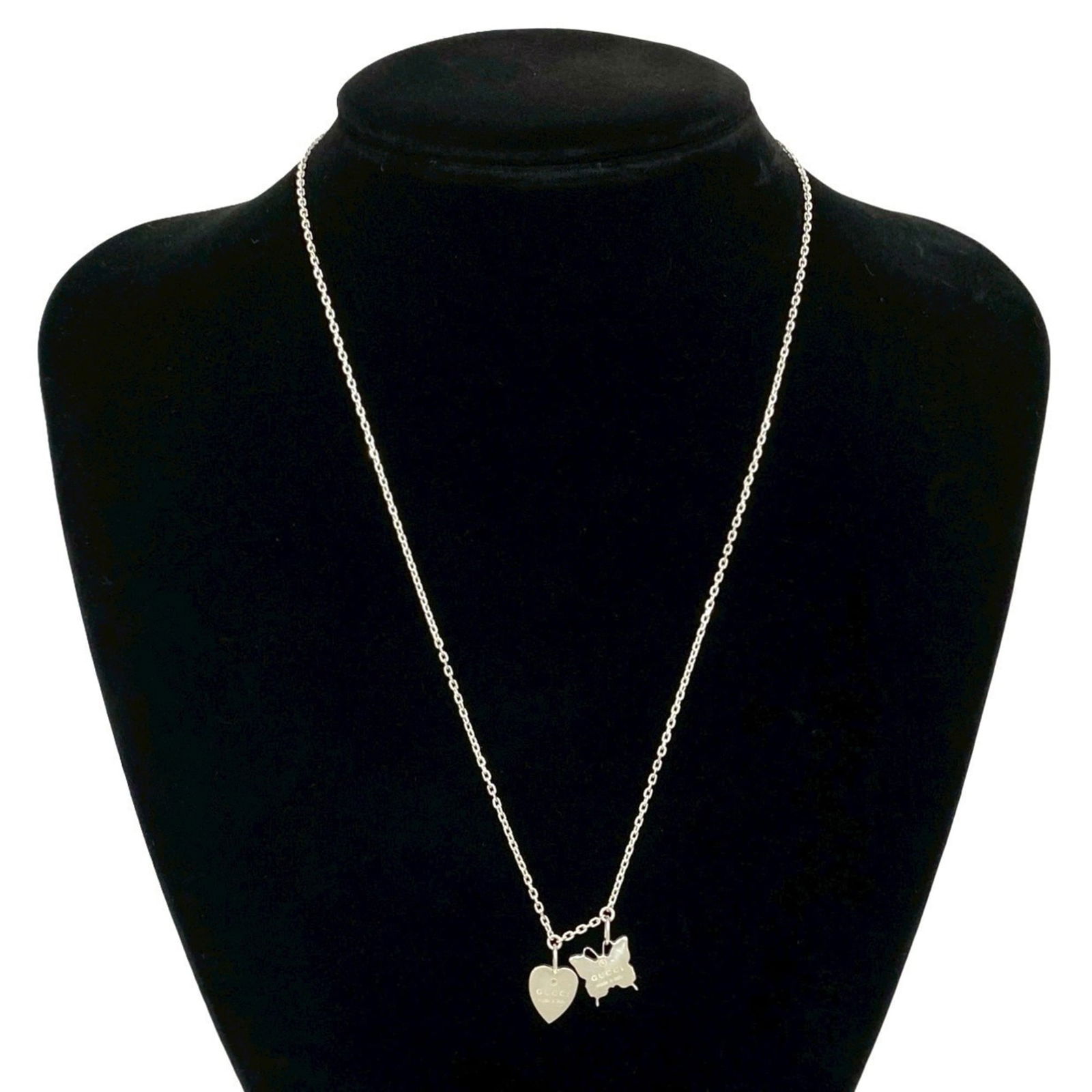 40255 GUCCI Heart and Butterfly Motif Silver 925 Necklace Pendant Choker: 40255 GUCCI Heart and Butterfly Motif Silver 925 Necklace Pendant Choker This listing features 40255 GUCCI Heart and Butterfly Motif Silver 925 Necklace Pendant Choker. Item specifics are provided bel