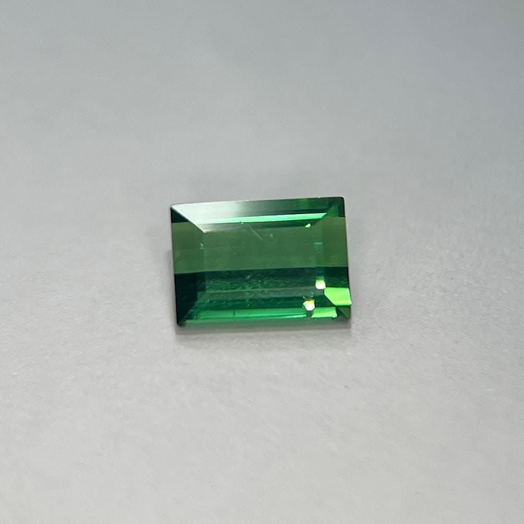 Loose Tourmaline Gemstone - Baguette 1.8ct Green SI: Loose Tourmaline Gemstone - Baguette 1.8ct Green SI This listing features Loose Tourmaline Gemstone - Baguette 1.8ct Green SI. Item specifics are provided below. Item Specifics: Type: Tourmaline