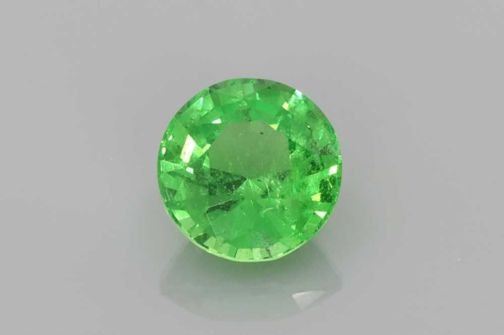 Loose Garnet Gemstone - Round 1.14ct Green EC: Loose Garnet Gemstone - Round 1.14ct Green EC This listing features Loose Garnet Gemstone - Round 1.14ct Green EC. Item specifics are provided below. Item Specifics: Type: Garnet Carat: 1.14 Cut: