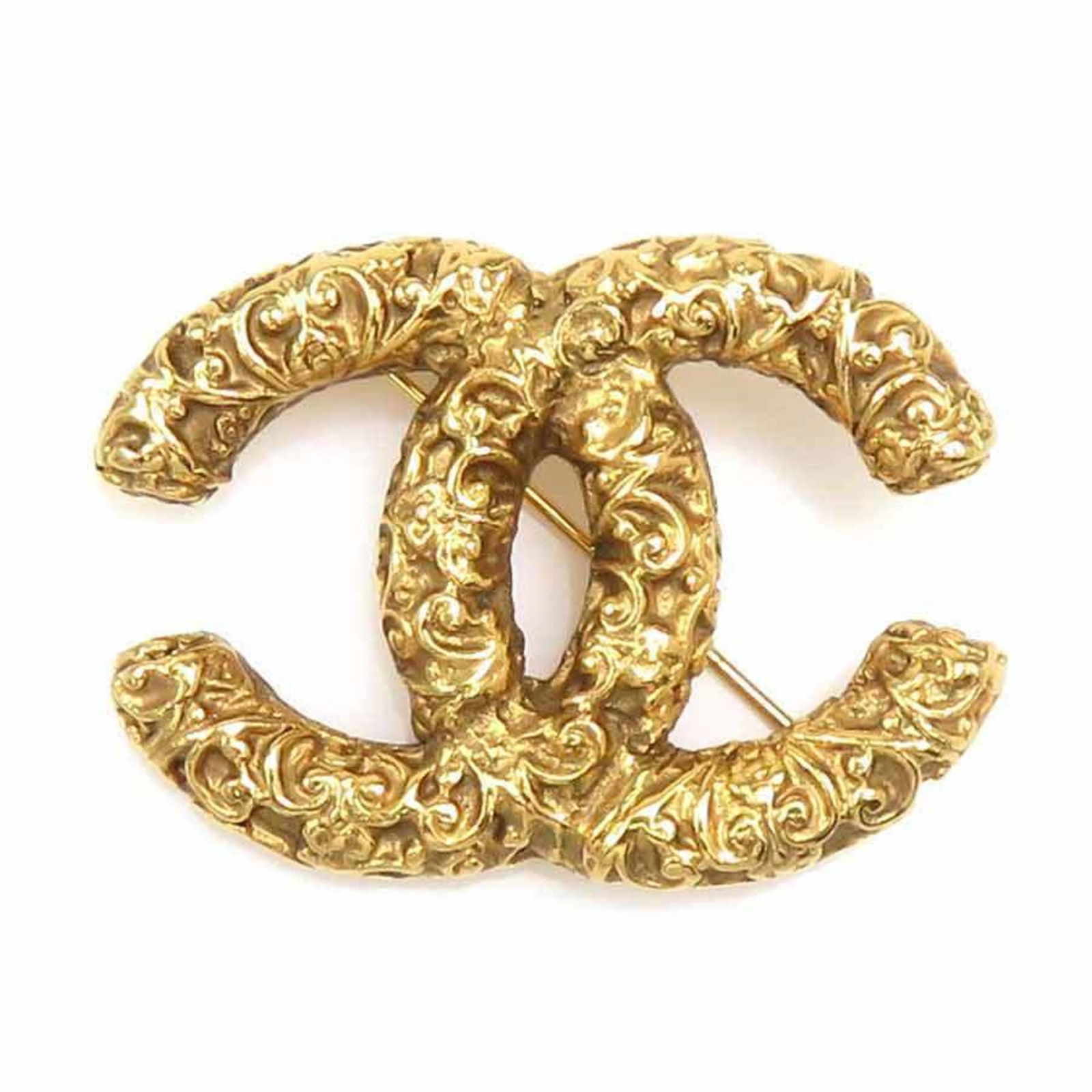 Metal Chanel Brooch: Metal Chanel Brooch This listing features Metal Chanel Brooch. Item specifics are provided below. Item Specifics: Brand: Chanel Type: Brooch Gender: Women Material: Metal Color: Gold Size (Hxwxd):