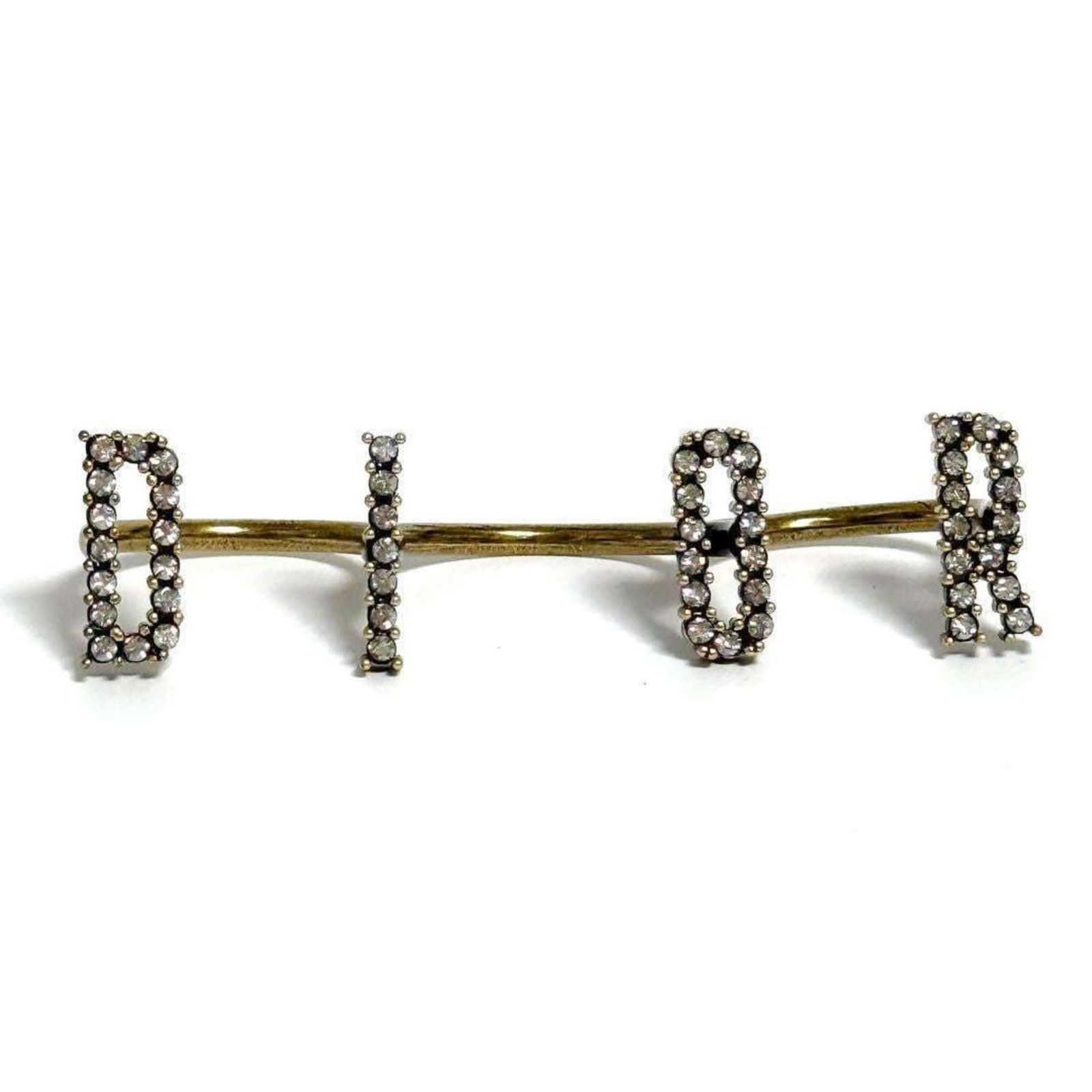 Metal Christian Dior Band Ring: Metal Christian Dior Band Ring This listing features Metal Christian Dior Band Ring. Item specifics are provided below. Item Specifics: Brand: Christian Dior Type: Band Ring Gender: Women Material: