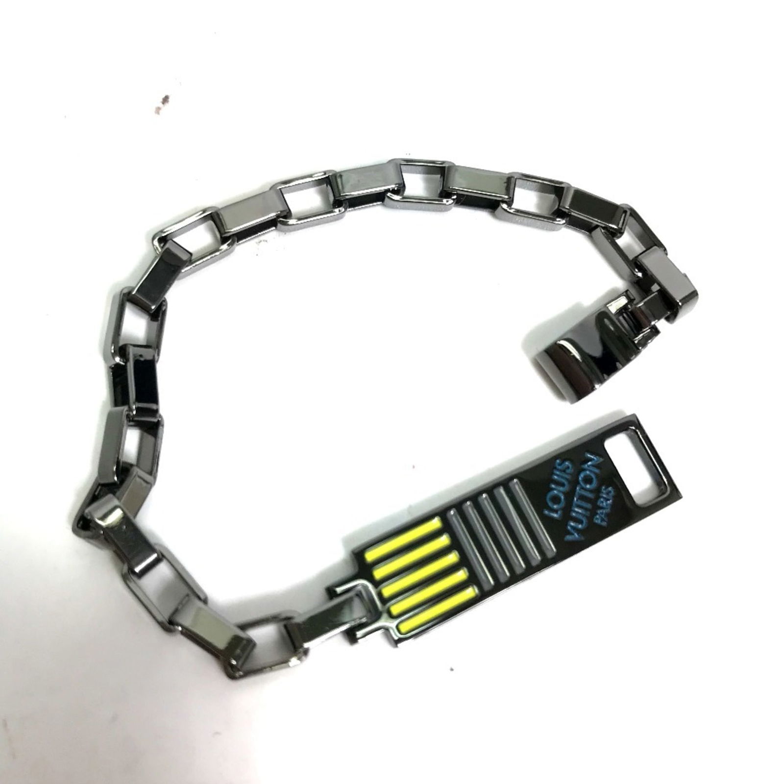 Metal Louis Vuitton Charm Bracelet: Metal Louis Vuitton Charm Bracelet This listing features Metal Louis Vuitton Charm Bracelet. Item specifics are provided below. Item Specifics: Brand: Louis Vuitton Type: Charm Bracelet Gender: