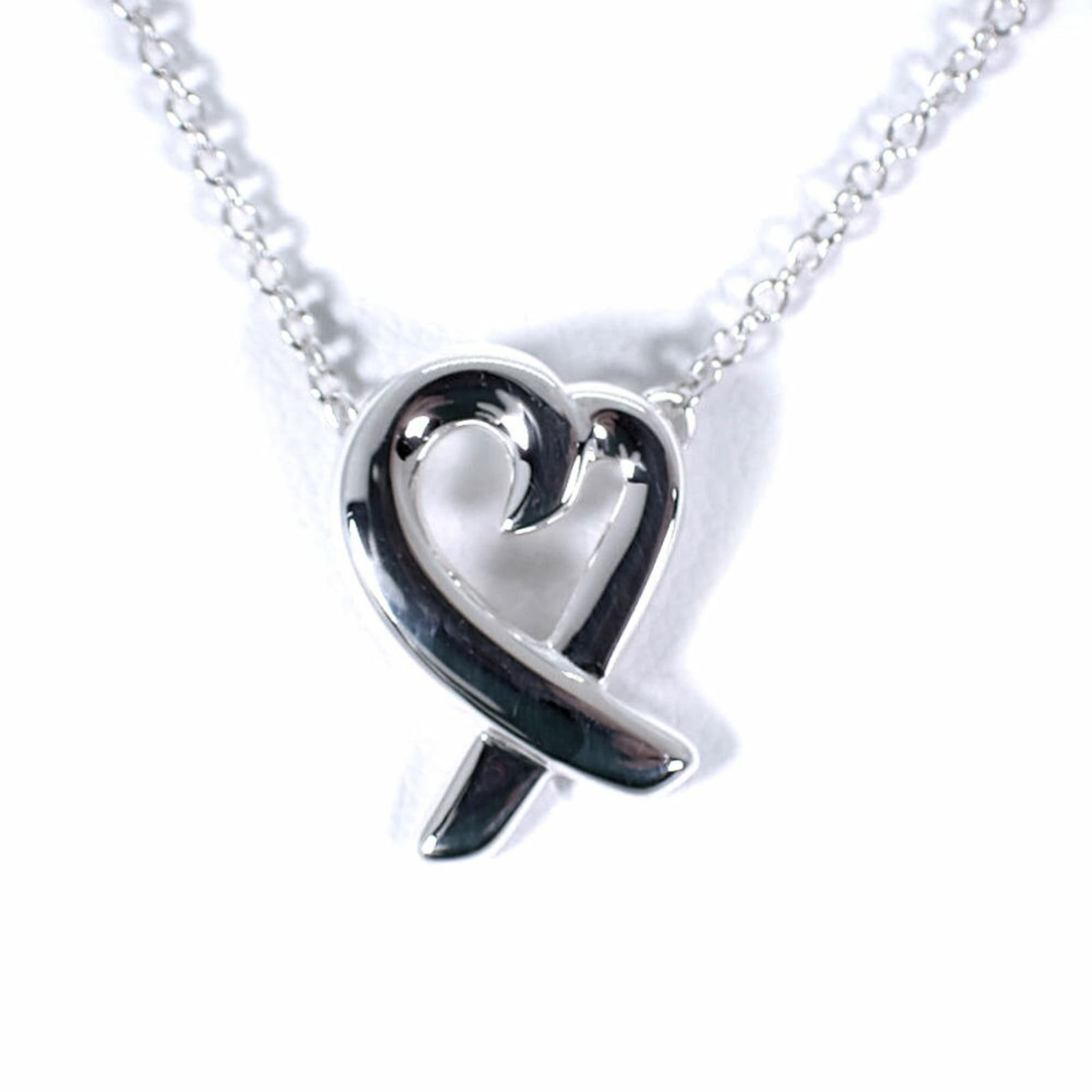 Necklace TIFFANY 925 Loving Heart Pendant: Necklace TIFFANY 925 Loving Heart Pendant This listing features Necklace TIFFANY 925 Loving Heart Pendant. Item specifics are provided below. Item Specifics: Brand: Tiffany Necklace Type: Necklace Gen