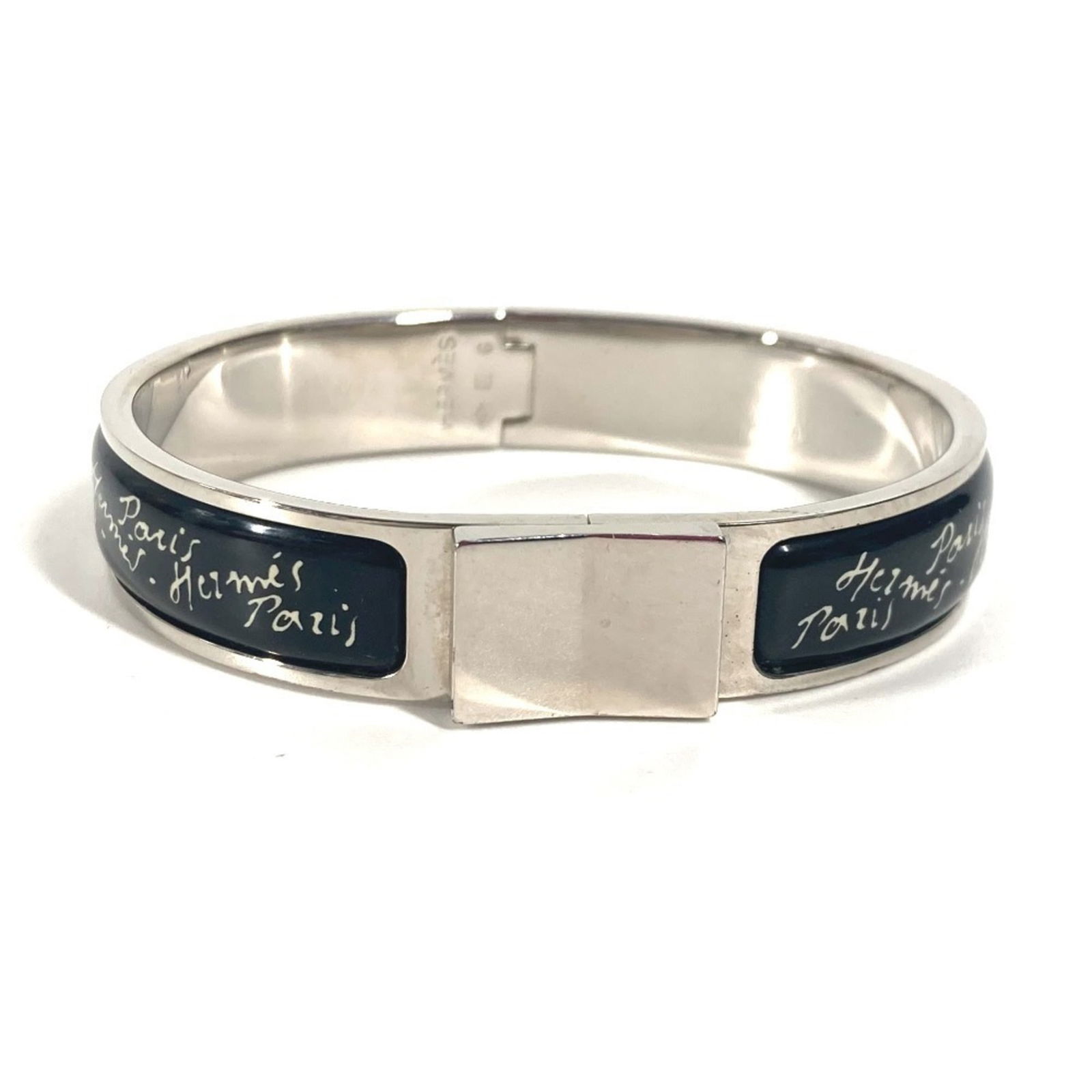 Metal Hermes Bangle: Metal Hermes Bangle This listing features Metal Hermes Bangle. Item specifics are provided below. Item Specifics: Brand: Hermes Type: Bangle Gender: Women Material: Metal Color: Black, Silver Total