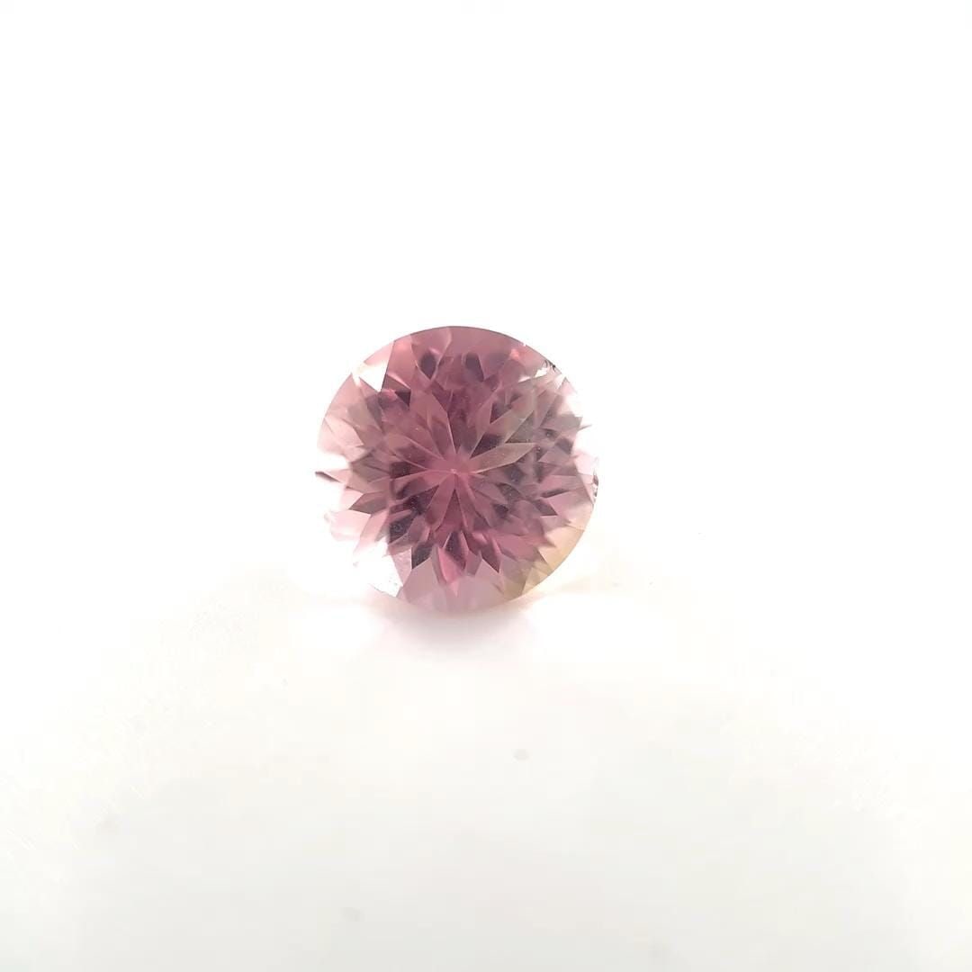 Loose Tourmaline Gemstone - Round 2.7ct Pink SI: Loose Tourmaline Gemstone - Round 2.7ct Pink SI This listing features Loose Tourmaline Gemstone - Round 2.7ct Pink SI. Item specifics are provided below. Item Specifics: Type: Tourmaline Carat: 2.7