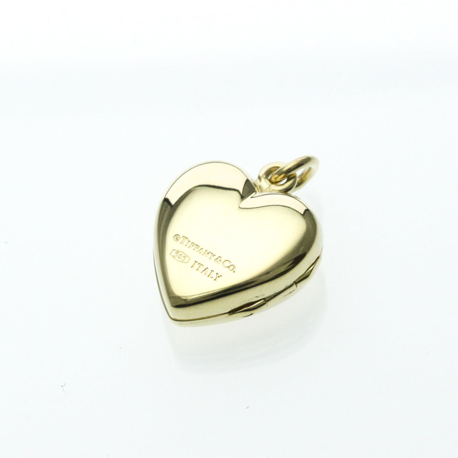 Women Fashion Locket (Gold) - Tiffany Locket Pendant Heart Top Yellow Gold (14K) No Stone Men: Women Fashion Locket (Gold) - Tiffany Locket Pendant Heart Top Yellow Gold (14K) No Stone Men This listing features Women Fashion Locket (Gold) - Tiffany Locket Pendant Heart Top Yellow Gold (14K) No