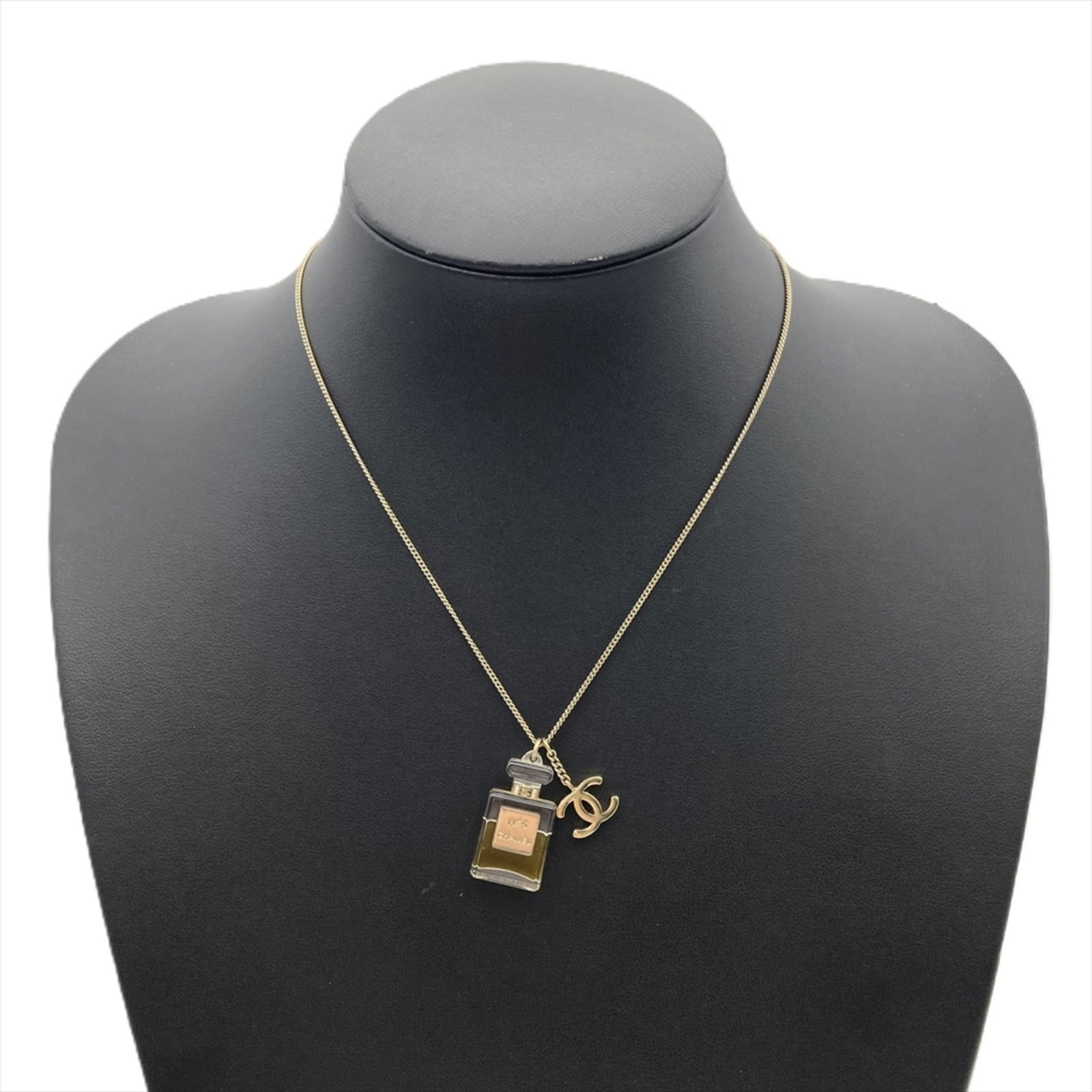 Women Chanel No. 5 Coco Mark Necklace Metal 09A Gold Perfume Bottle for: Women Chanel No. 5 Coco Mark Necklace Metal 09A Gold Perfume Bottle for This listing features Women Chanel No. 5 Coco Mark Necklace Metal 09A Gold Perfume Bottle for. Item specifics are provided