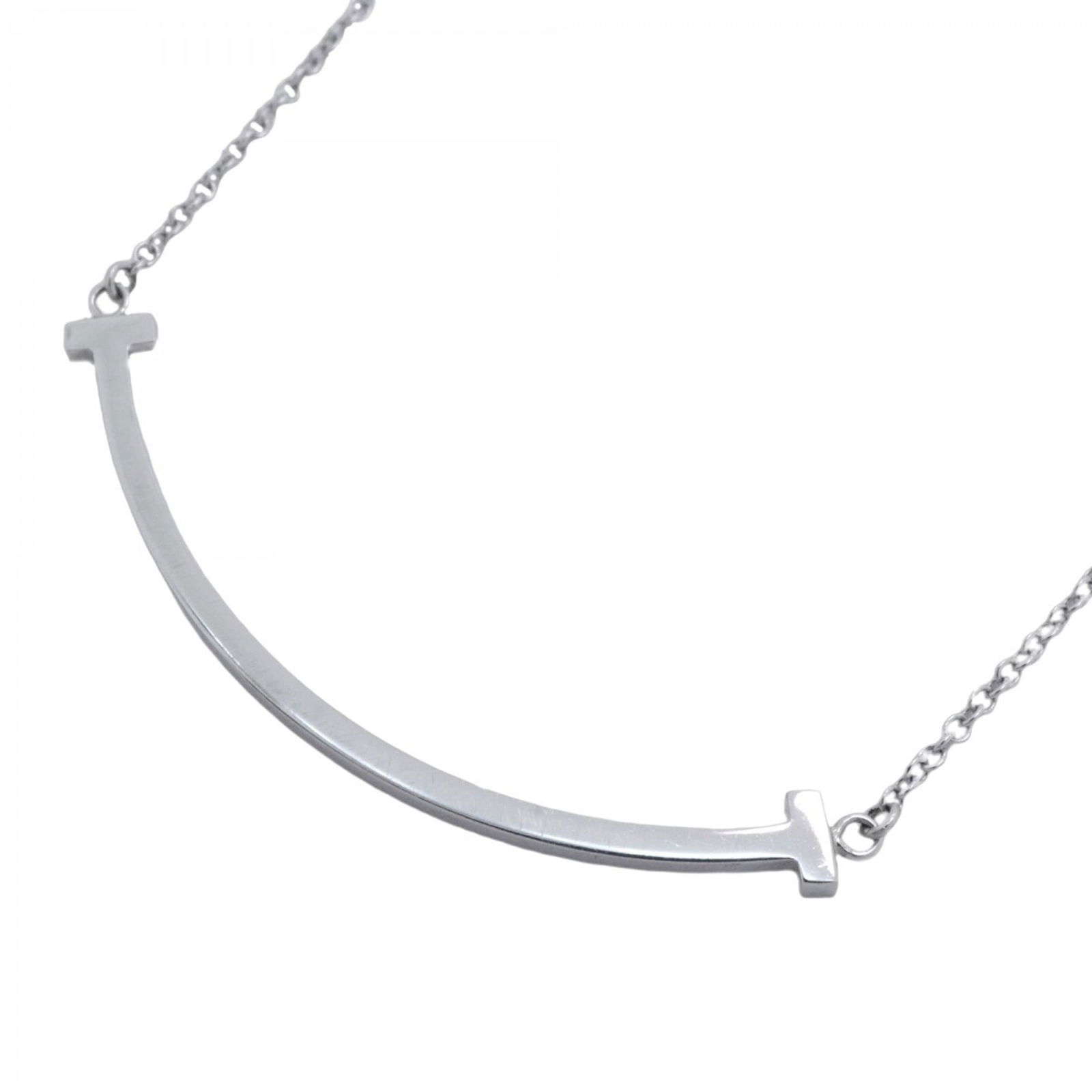 Women Tiffany T Smile Small Necklace in 18K White Gold for: Women Tiffany T Smile Small Necklace in 18K White Gold for This listing features Women Tiffany T Smile Small Necklace in 18K White Gold for. Item specifics are provided below. Item Specifics: Brand: