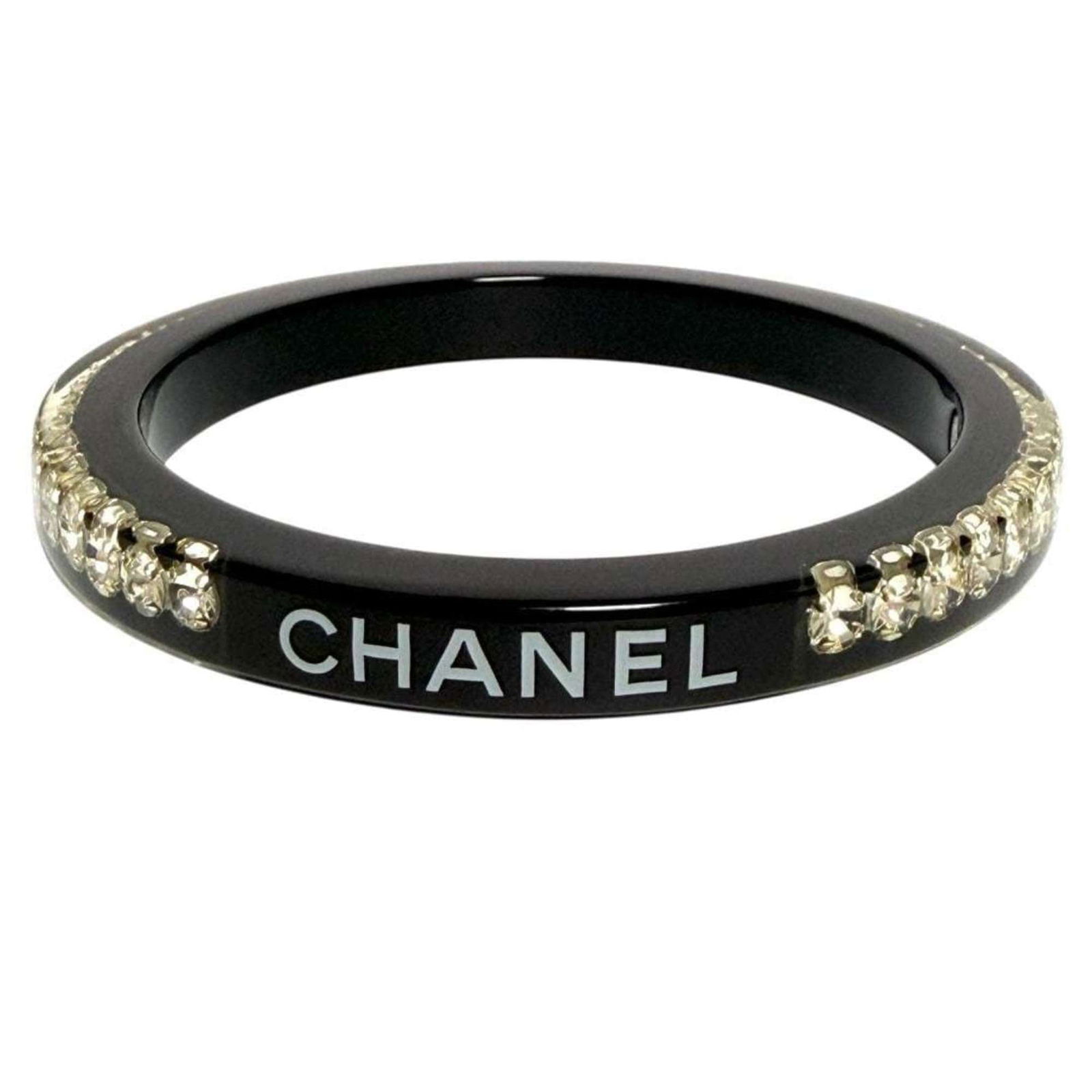 Rhinestone - Chanel Bangle Plastic: Rhinestone - Chanel Bangle Plastic This listing features Rhinestone - Chanel Bangle Plastic. Item specifics are provided below. Item Specifics: Brand: Chanel Type: Bangle Gender: Women Material: Plast