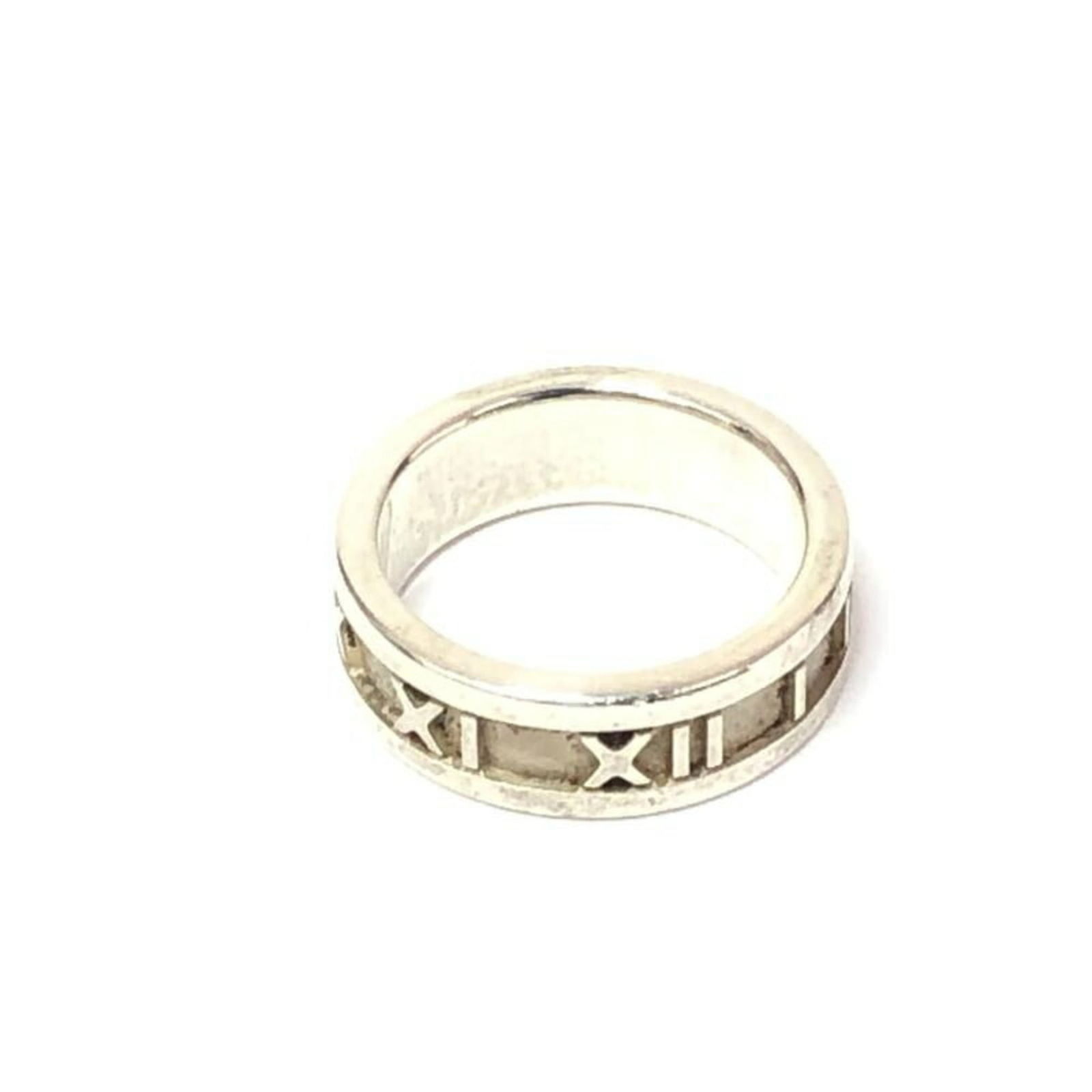 Ring Tiffany Band: Ring Tiffany Band This listing features Ring Tiffany Band. Item specifics are provided below. Item Specifics: Brand: Tiffany Type: Band Ring Gender: Women Us Size: 5.5 Condition: Used (good), Traces
