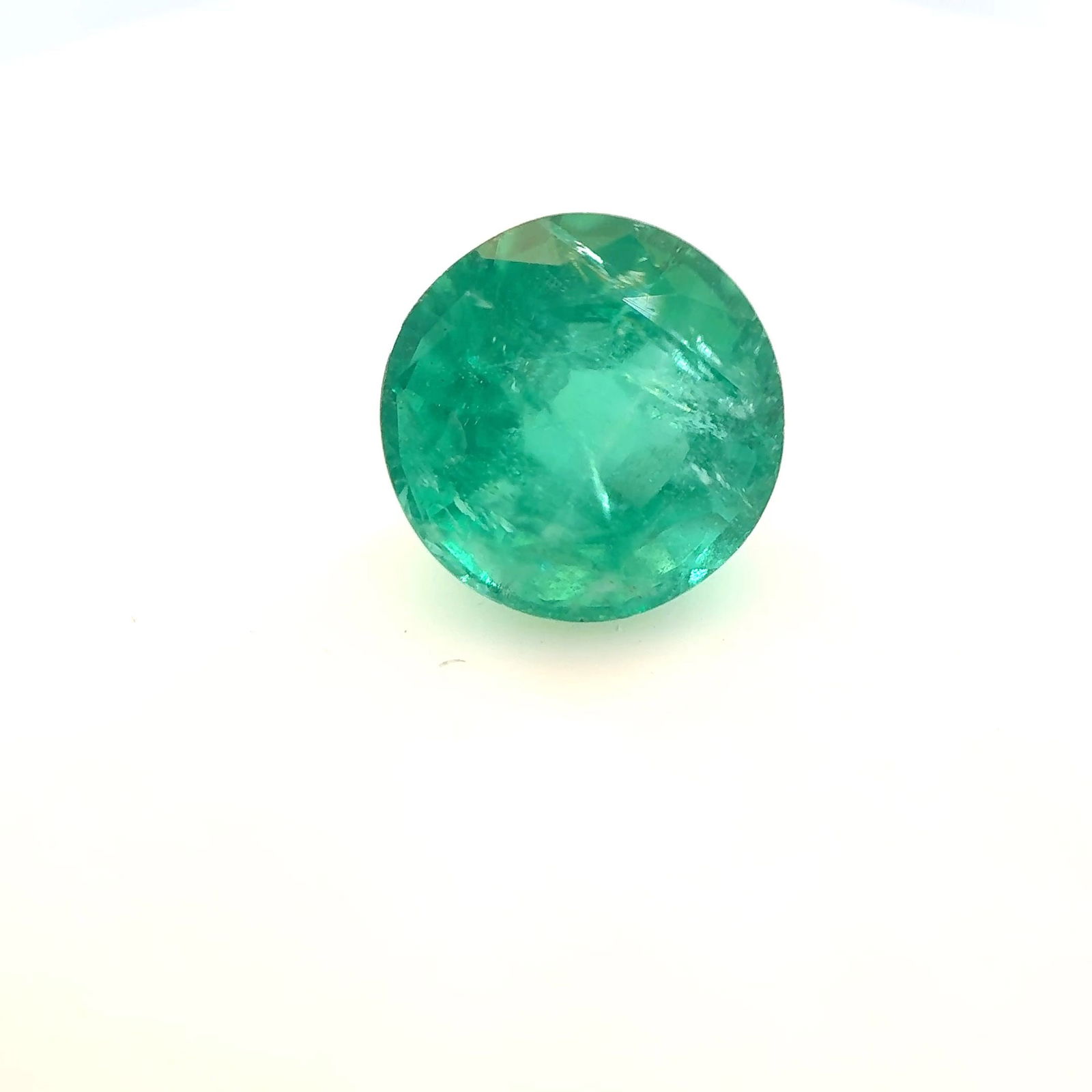 Loose Emerald Gemstone - Round 1.76ct Green MI: Loose Emerald Gemstone - Round 1.76ct Green MI This listing features Loose Emerald Gemstone - Round 1.76ct Green MI. Item specifics are provided below. Item Specifics: Type: Emerald Carat: 1.76 Cut: