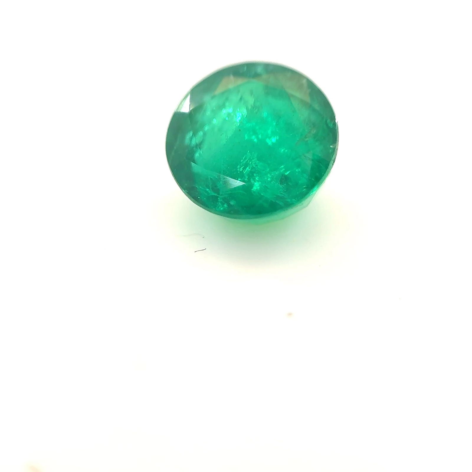 Loose Emerald Gemstone - Round 1.75ct Green MI: Loose Emerald Gemstone - Round 1.75ct Green MI This listing features Loose Emerald Gemstone - Round 1.75ct Green MI. Item specifics are provided below. Item Specifics: Type: Emerald Carat: 1.75 Cut: