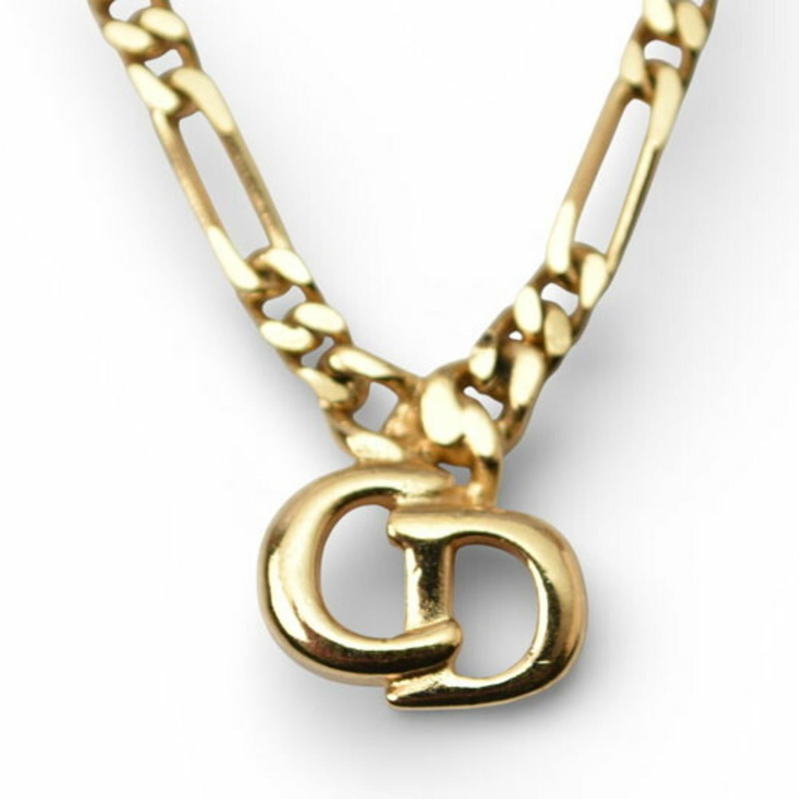 motif Christian Dior necklace in gold with: motif Christian Dior necklace in gold with This listing features motif Christian Dior necklace in gold with. Item specifics are provided below. Item Specifics: Brand: Christian Dior Necklace Type: