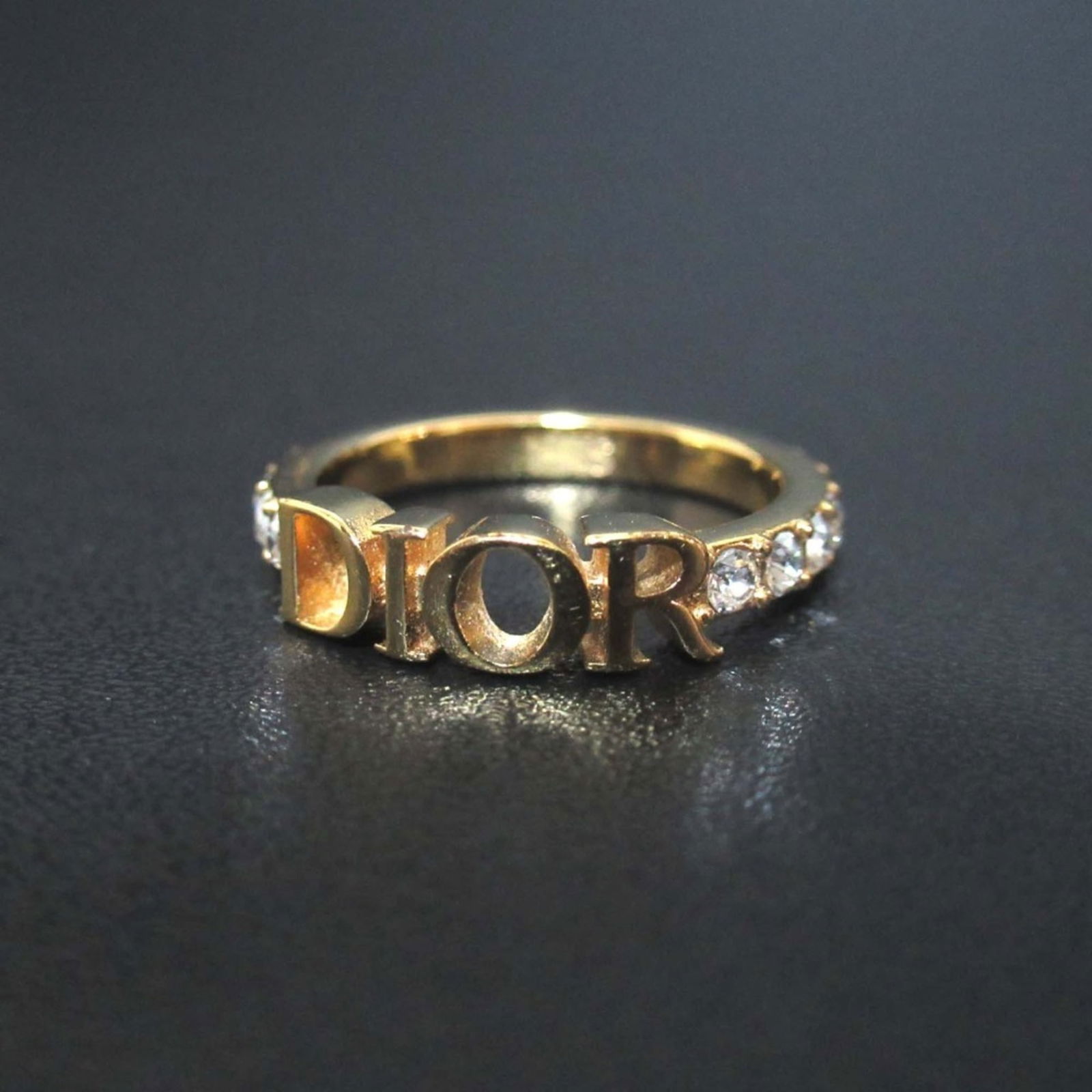 Ring Christian Dior Band: Ring Christian Dior Band This listing features Ring Christian Dior Band. Item specifics are provided below. Item Specifics: Brand: Christian Dior Type: Band Ring Gender: Women Color: Gold Us Size: 6 C
