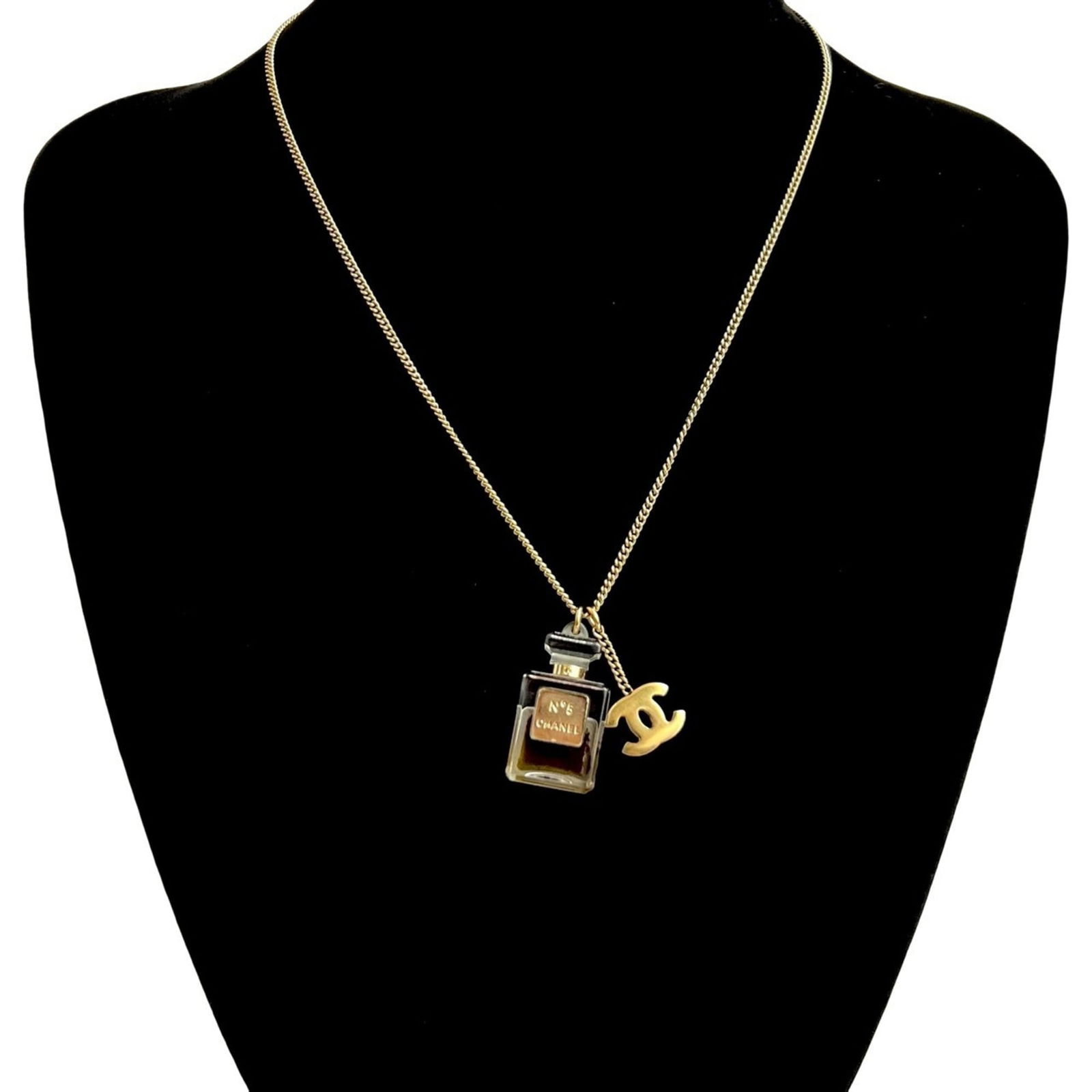 97719 CHANEL Coco Mark Number 5 Motif GP Resin Chain Necklace Pendant Gold: 97719 CHANEL Coco Mark Number 5 Motif GP Resin Chain Necklace Pendant Gold This listing features 97719 CHANEL Coco Mark Number 5 Motif GP Resin Chain Necklace Pendant Gold. Item specifics are