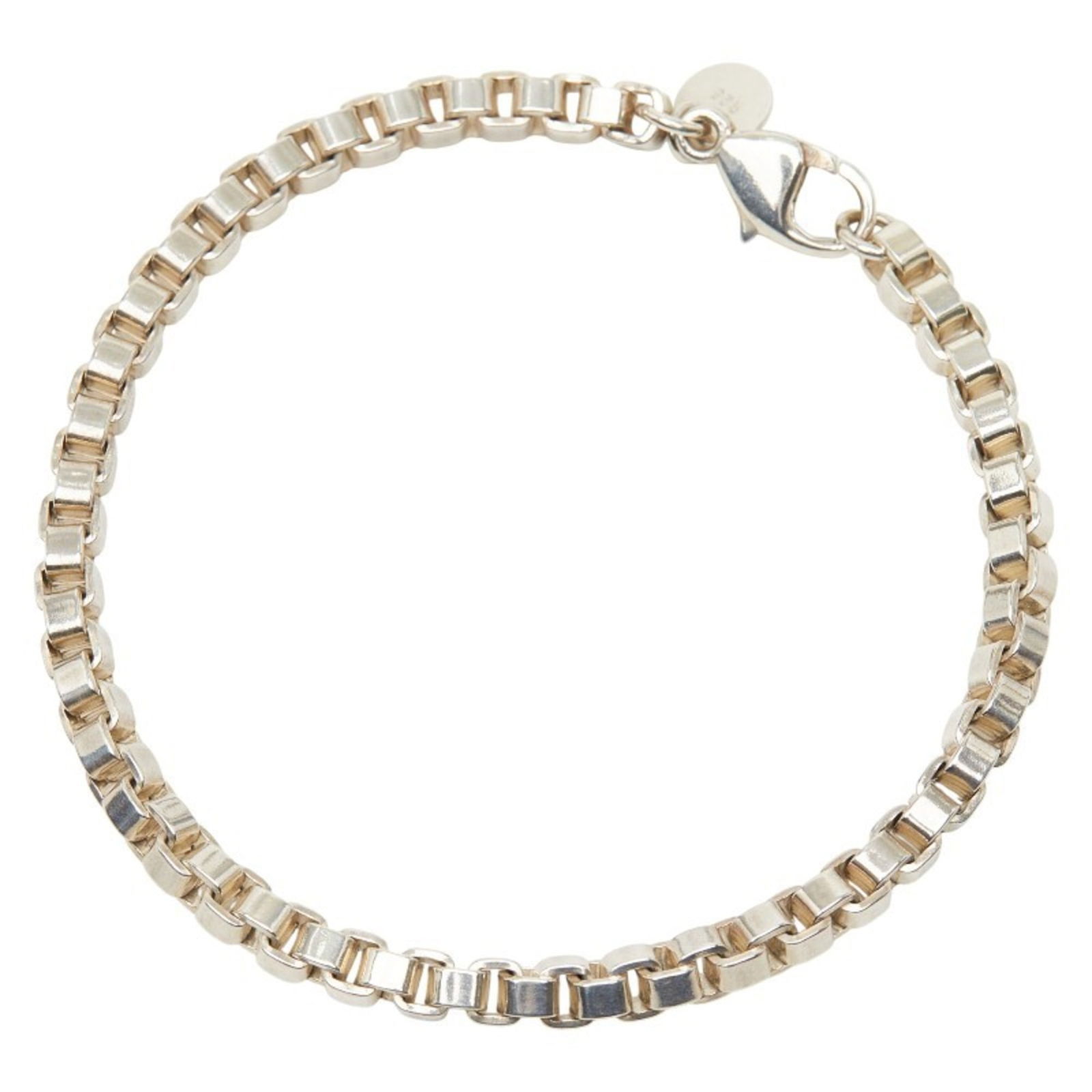 925 Tiffany Charm Bracelet Silver: 925 Tiffany Charm Bracelet Silver This listing features 925 Tiffany Charm Bracelet Silver. Item specifics are provided below. Item Specifics: Brand: Tiffany Type: Charm Bracelet Gender: Women Material