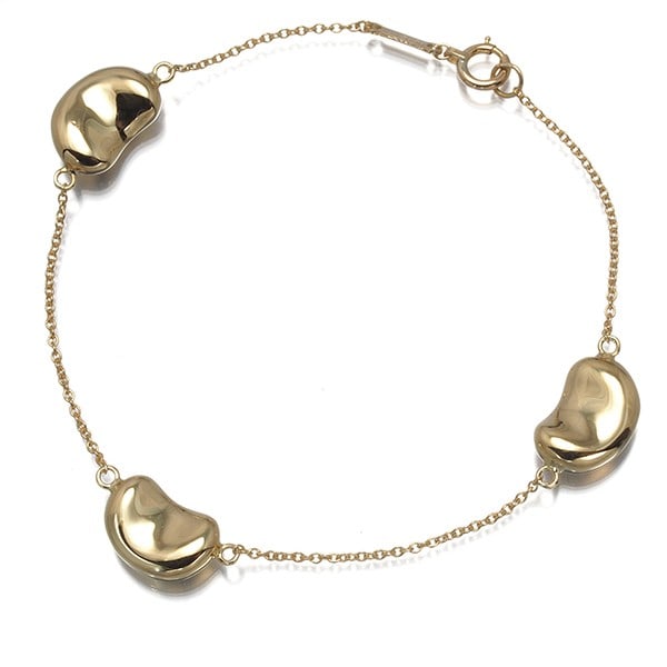 Gold Tiffany&Co. Bracelet Bean Station 18K 750 Yellow: Gold Tiffany&Co. Bracelet Bean Station 18K 750 Yellow This listing features Gold Tiffany&Co. Bracelet Bean Station 18K 750 Yellow. Item specifics are provided below. Item Specifics: Brand: Tiffany &