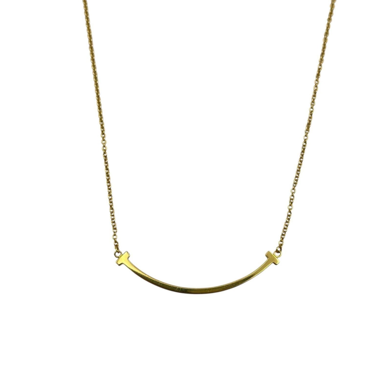 Women Tiffany & Co. T Smile Necklace in 18K Yellow Gold for: Women Tiffany & Co. T Smile Necklace in 18K Yellow Gold for This listing features Women Tiffany & Co. T Smile Necklace in 18K Yellow Gold for. Item specifics are provided below. Item Specifics: Brand: