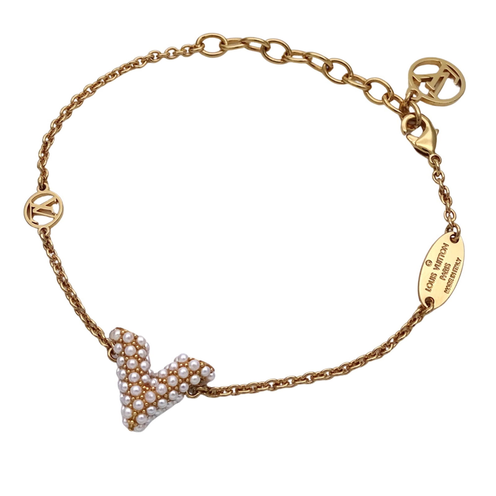 Metal Louis Vuitton Charm Bracelet: Metal Louis Vuitton Charm Bracelet This listing features Metal Louis Vuitton Charm Bracelet. Item specifics are provided below. Item Specifics: Brand: Louis Vuitton Type: Charm Bracelet Gender: Women