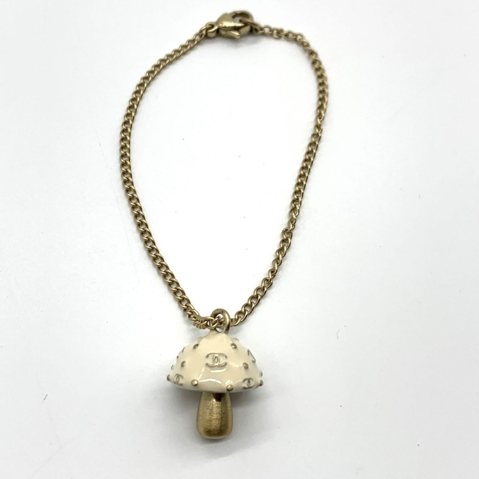 Metal Chanel Charm Bracelet: Metal Chanel Charm Bracelet This listing features Metal Chanel Charm Bracelet. Item specifics are provided below. Item Specifics: Brand: Chanel Type: Charm Bracelet Gender: Women Material: Metal