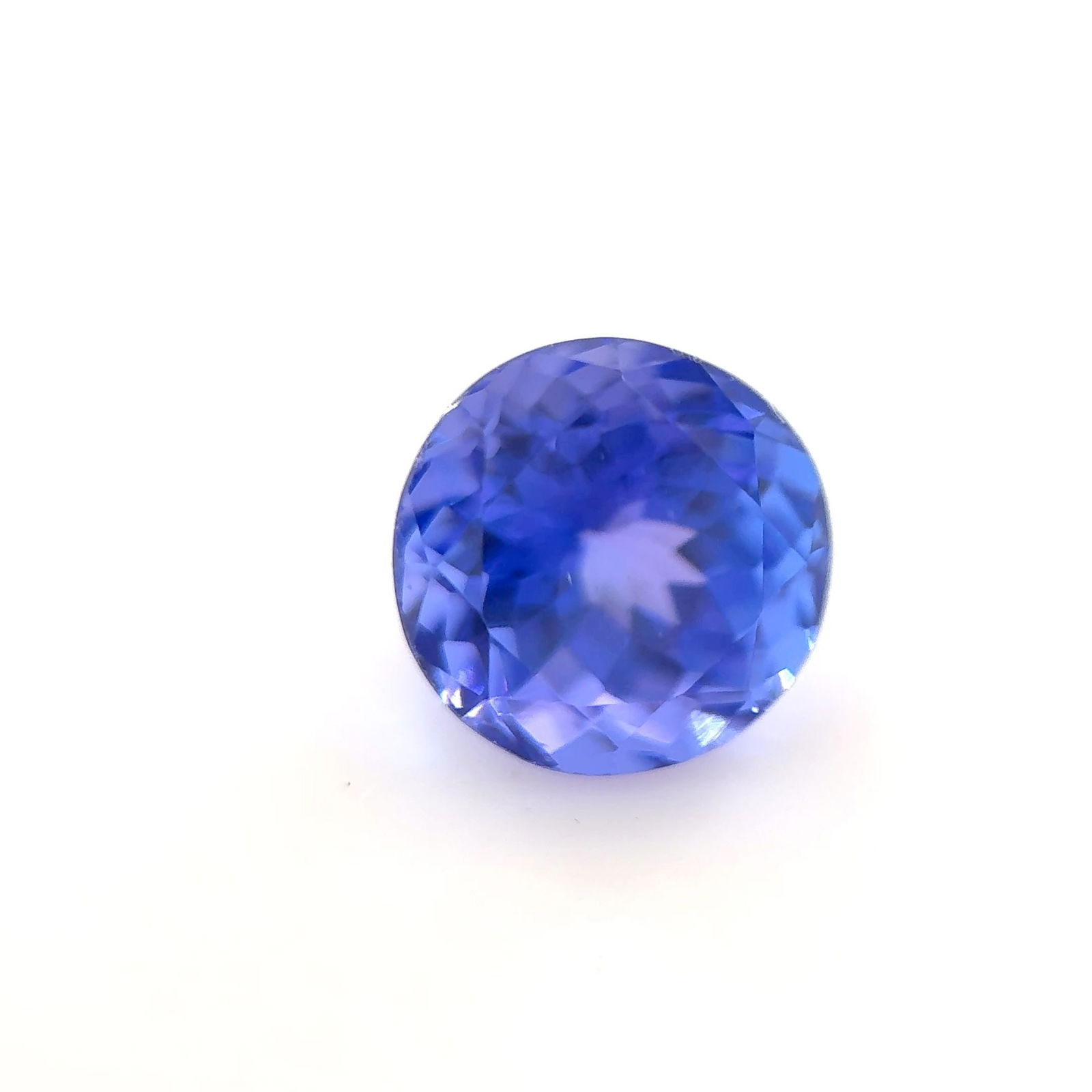 Loose Tanzanite Gemstone - Round 1.79ct Blue EC: Loose Tanzanite Gemstone - Round 1.79ct Blue EC This listing features Loose Tanzanite Gemstone - Round 1.79ct Blue EC. Item specifics are provided below. Item Specifics: Type: Tanzanite Carat: 1.79