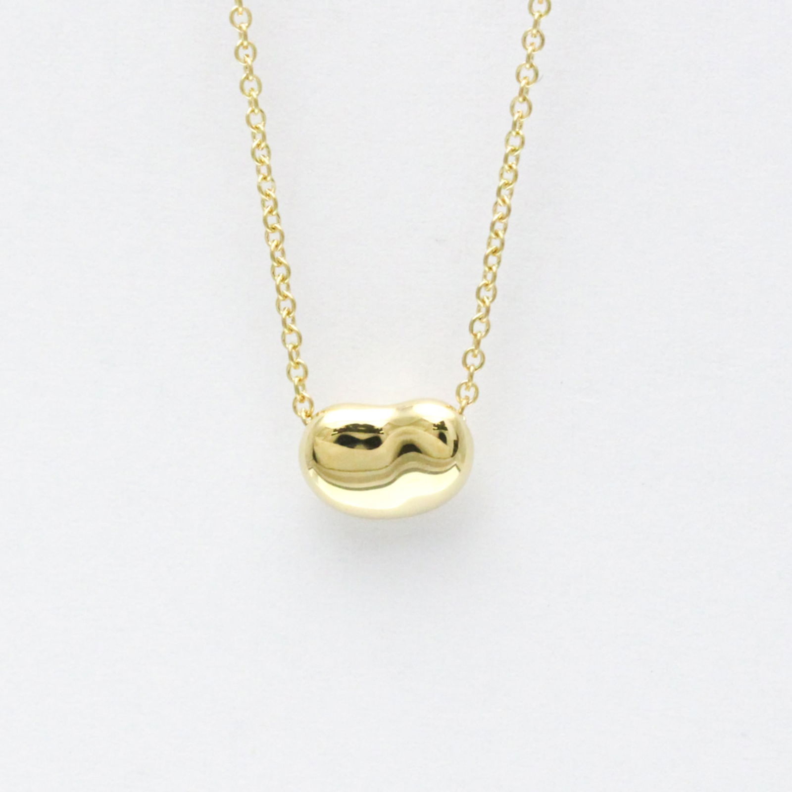 Men Fashion Pendant Necklace (Gold) - Tiffany Bean Yellow Gold (18K) No Stone Women: Men Fashion Pendant Necklace (Gold) - Tiffany Bean Yellow Gold (18K) No Stone Women This listing features Men Fashion Pendant Necklace (Gold) - Tiffany Bean Yellow Gold (18K) No Stone Women. Item