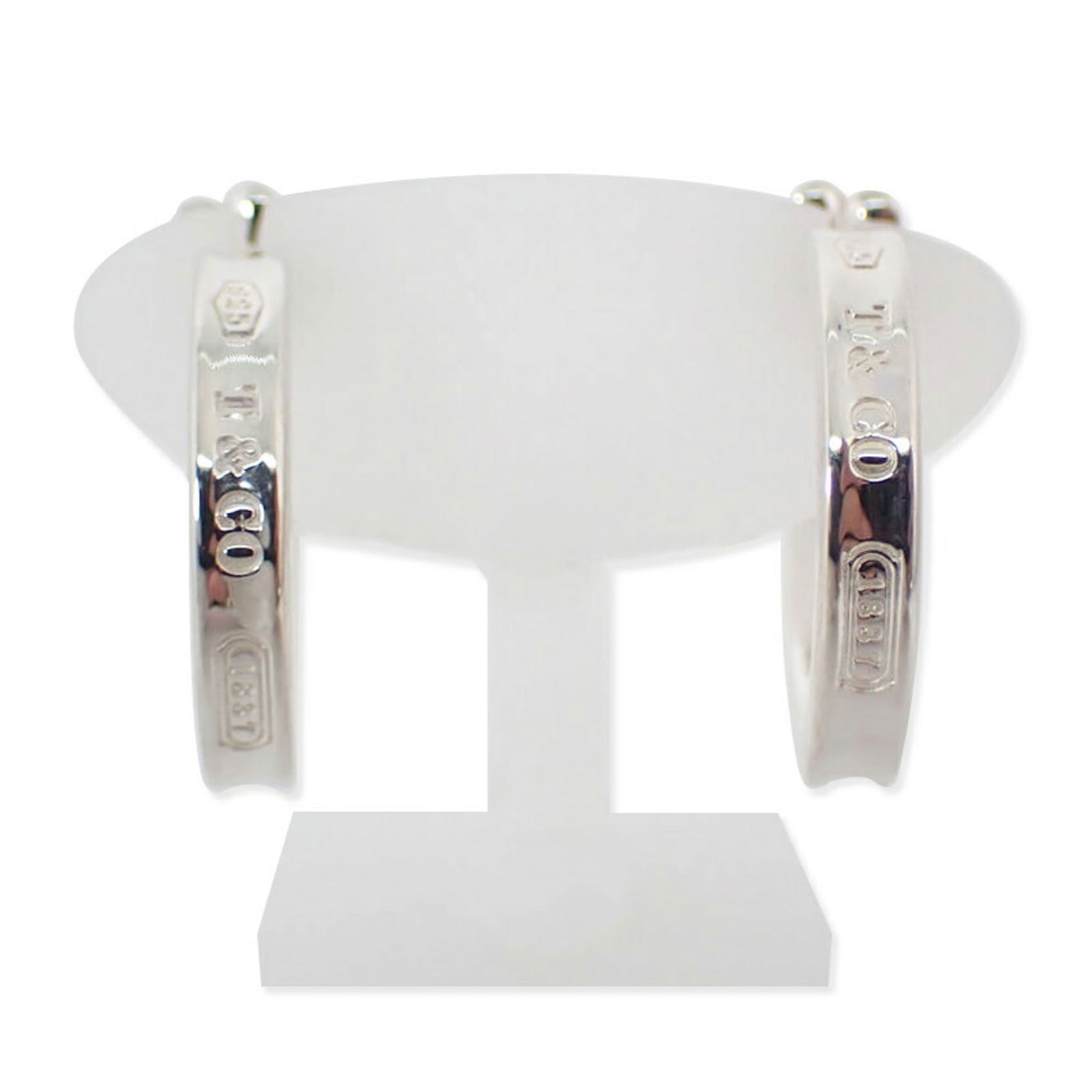 925 Tiffany Half Hoop Earrings Sterling Silver: 925 Tiffany Half Hoop Earrings Sterling Silver This listing features 925 Tiffany Half Hoop Earrings Sterling Silver. Item specifics are provided below. Item Specifics: Brand: Tiffany Type: Half Hoop