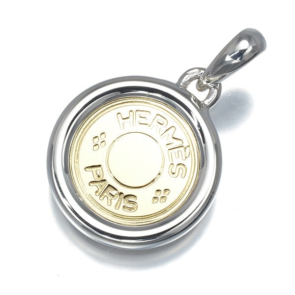 Gold Hermes Pendant Clou De Selle 925 Sterling Silver/ 18K 750 Yellow: Gold Hermes Pendant Clou De Selle 925 Sterling Silver/ 18K 750 Yellow This listing features Gold Hermes Pendant Clou De Selle 925 Sterling Silver/ 18K 750 Yellow. Item specifics are provided below. 