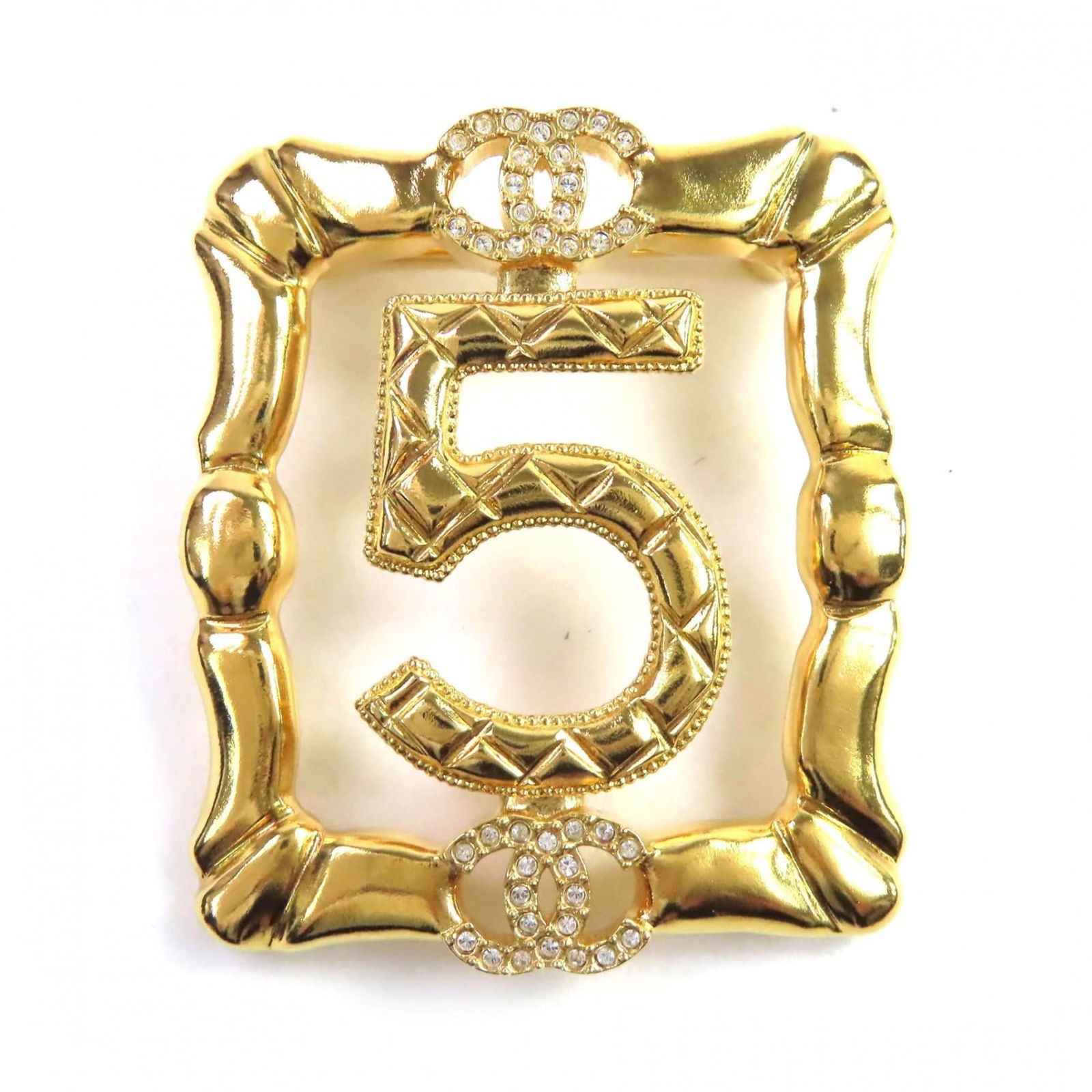Brooch Chanel: Brooch Chanel This listing features Brooch Chanel. Item specifics are provided below. Item Specifics: Brand: Chanel Type: Brooch Gender: Women Color: Gold Stone: Rhinestone Size (Hxwxd): 4.2cm x 3.8cm
