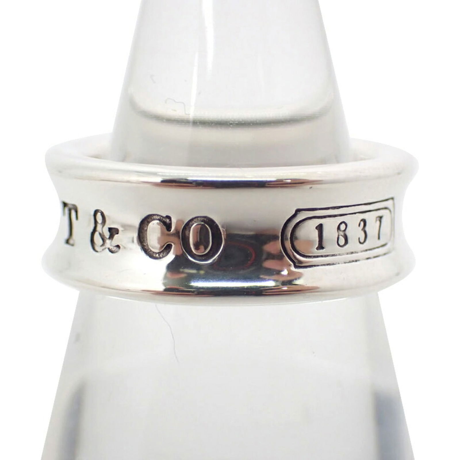925 Tiffany Band Ring Sterling Silver: 925 Tiffany Band Ring Sterling Silver This listing features 925 Tiffany Band Ring Sterling Silver. Item specifics are provided below. Item Specifics: Brand: Tiffany Type: Band Ring Gender: Women