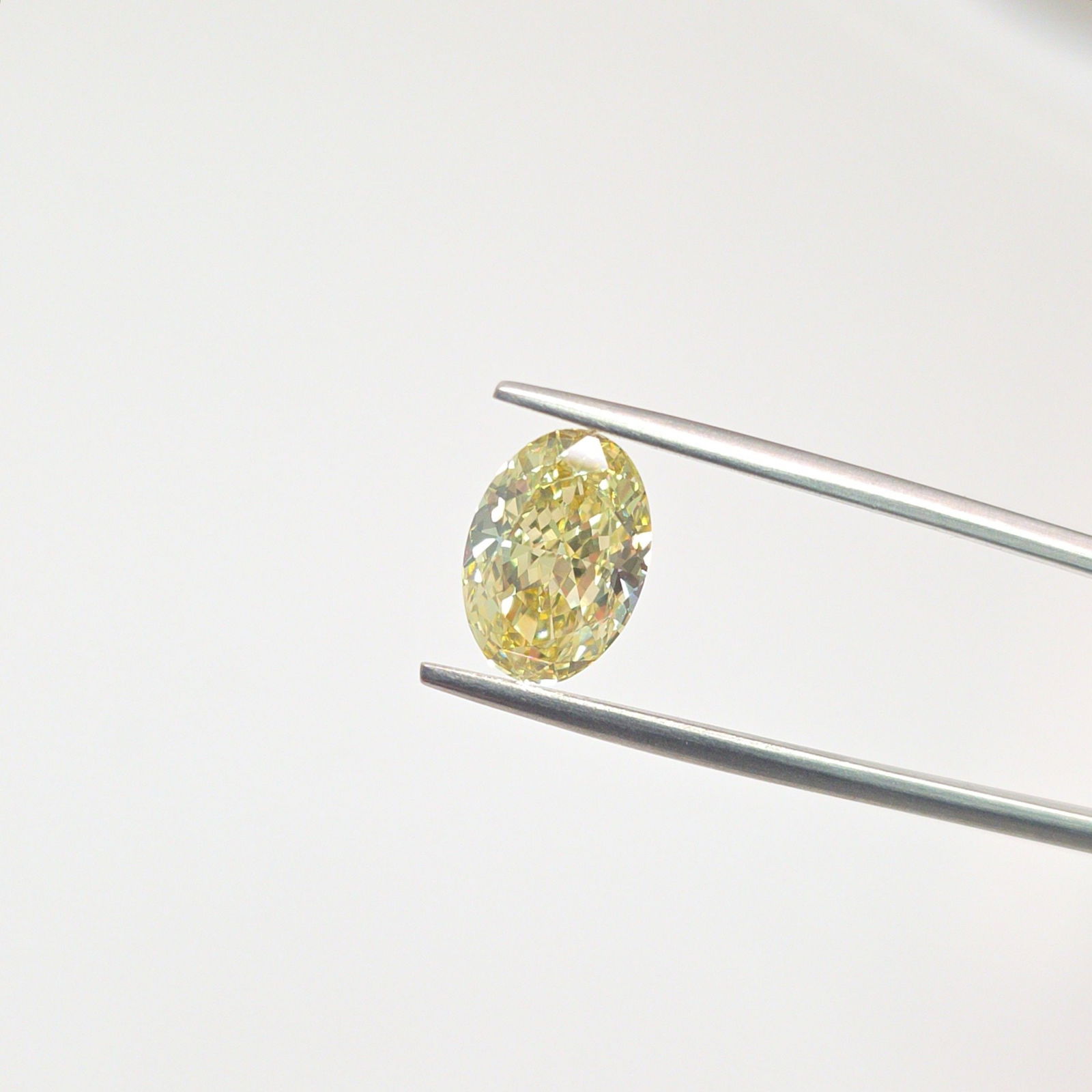 Loose Lab Diamond - IGI Oval 3.08ct Fancy Yellow VVS2: Loose Lab Diamond - IGI Oval 3.08ct Fancy Yellow VVS2 This listing features Loose Lab Diamond - IGI Oval 3.08ct Fancy Yellow VVS2. Item specifics are provided below. Item Specifics: Source: This Is