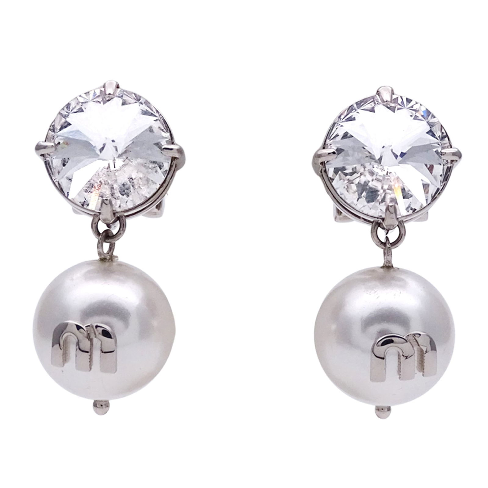 Metal Miu Clip Earrings: Metal Miu Clip Earrings This listing features Metal Miu Clip Earrings. Item specifics are provided below. Item Specifics: Brand: Miu Miu Type: Clip Earrings Gender: Women Material: Metal Color: