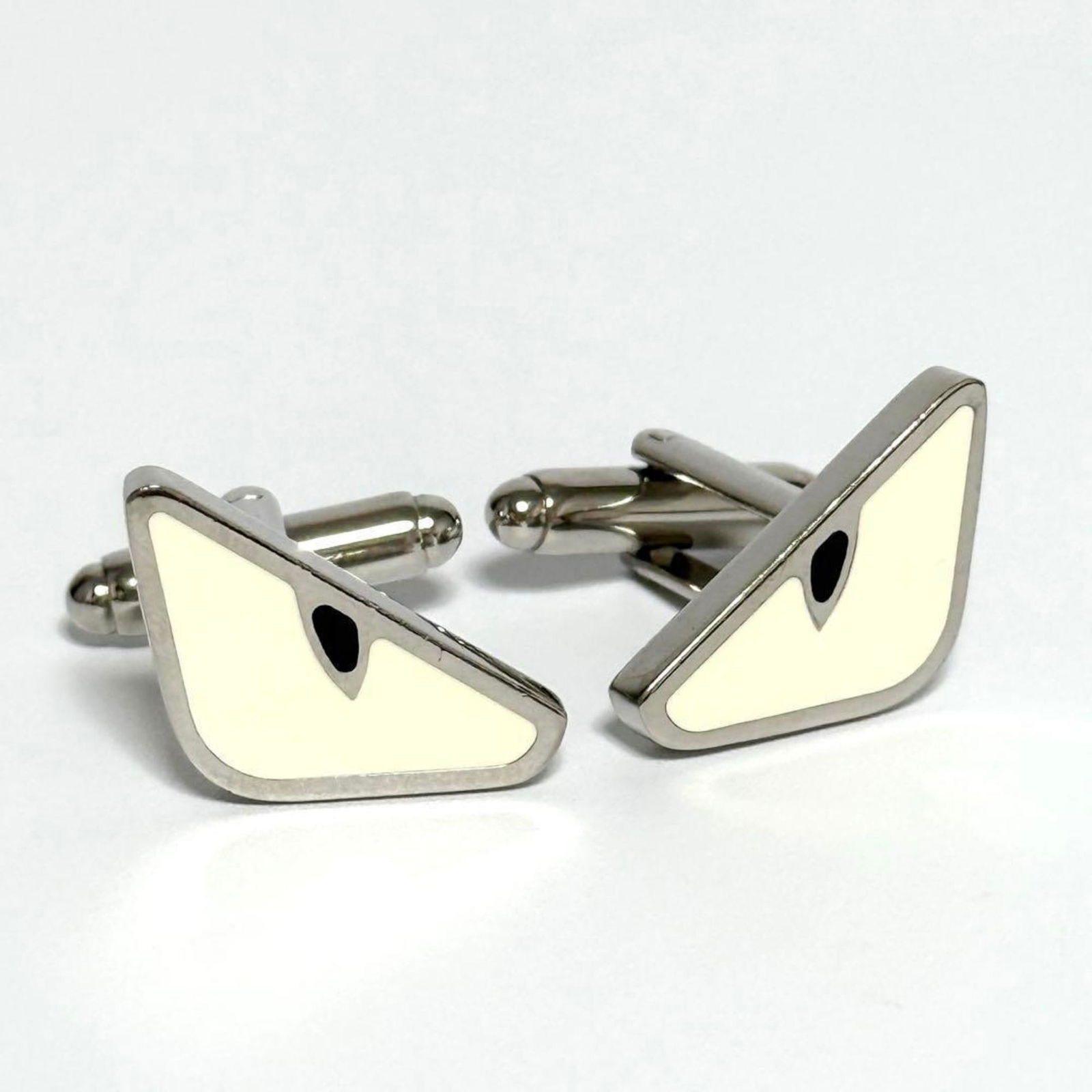 Metal Fendi Cufflinks: Metal Fendi Cufflinks This listing features Metal Fendi Cufflinks. Item specifics are provided below. Item Specifics: Brand: Fendi Type: Cufflinks Gender: Men Material: Metal Size (Hxwxd): 15.00mm x