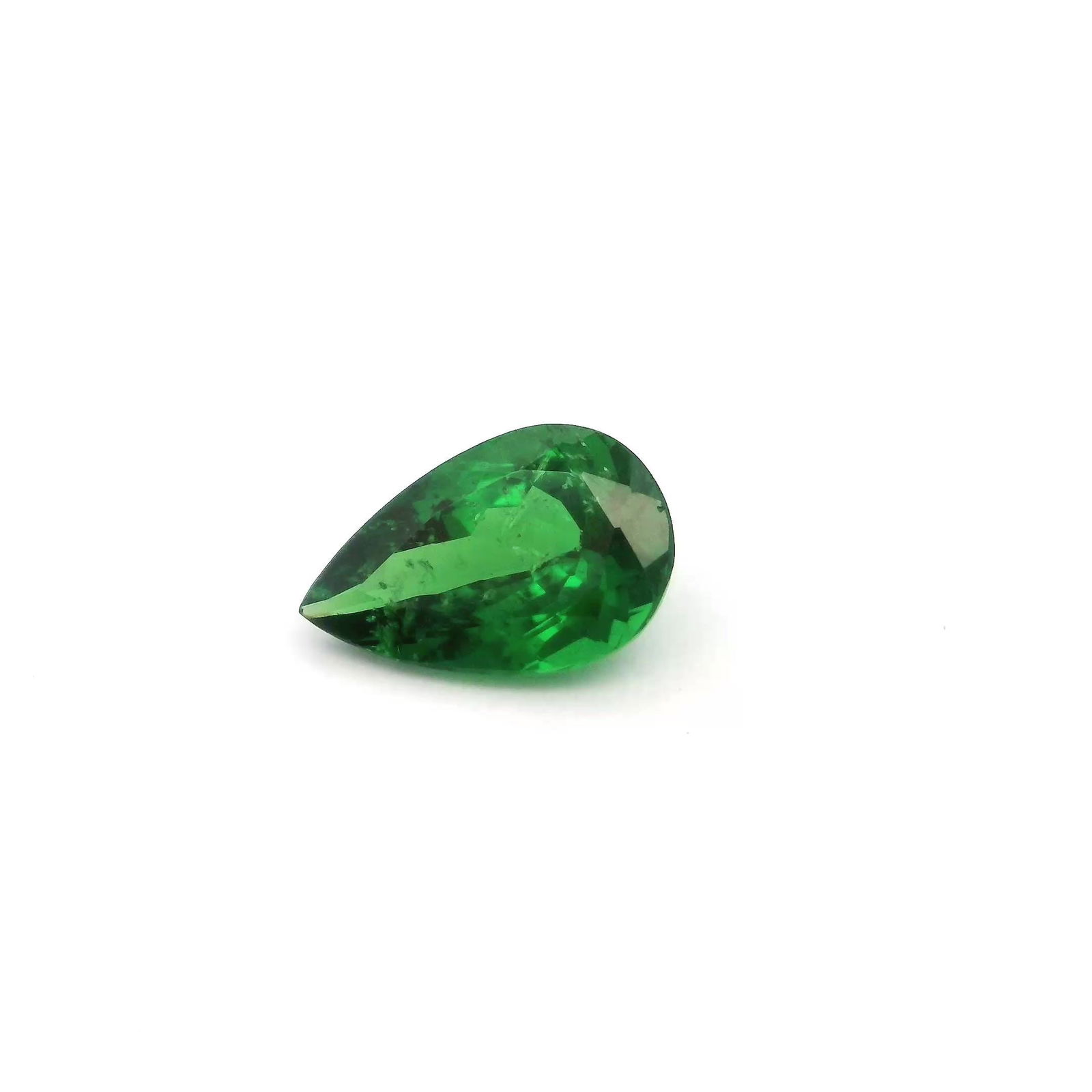 Loose Garnet Gemstone - Pear 1.41ct Green SI: Loose Garnet Gemstone - Pear 1.41ct Green SI This listing features Loose Garnet Gemstone - Pear 1.41ct Green SI. Item specifics are provided below. Item Specifics: Type: Garnet Carat: 1.41 Cut: