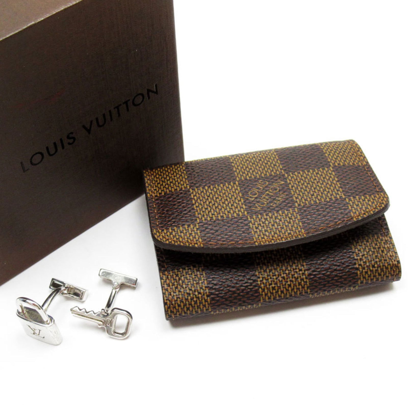 Metal Louis Vuitton Cufflinks: Metal Louis Vuitton Cufflinks This listing features Metal Louis Vuitton Cufflinks. Item specifics are provided below. Item Specifics: Brand: Louis Vuitton Type: Cufflinks Gender: Men Material: Metal
