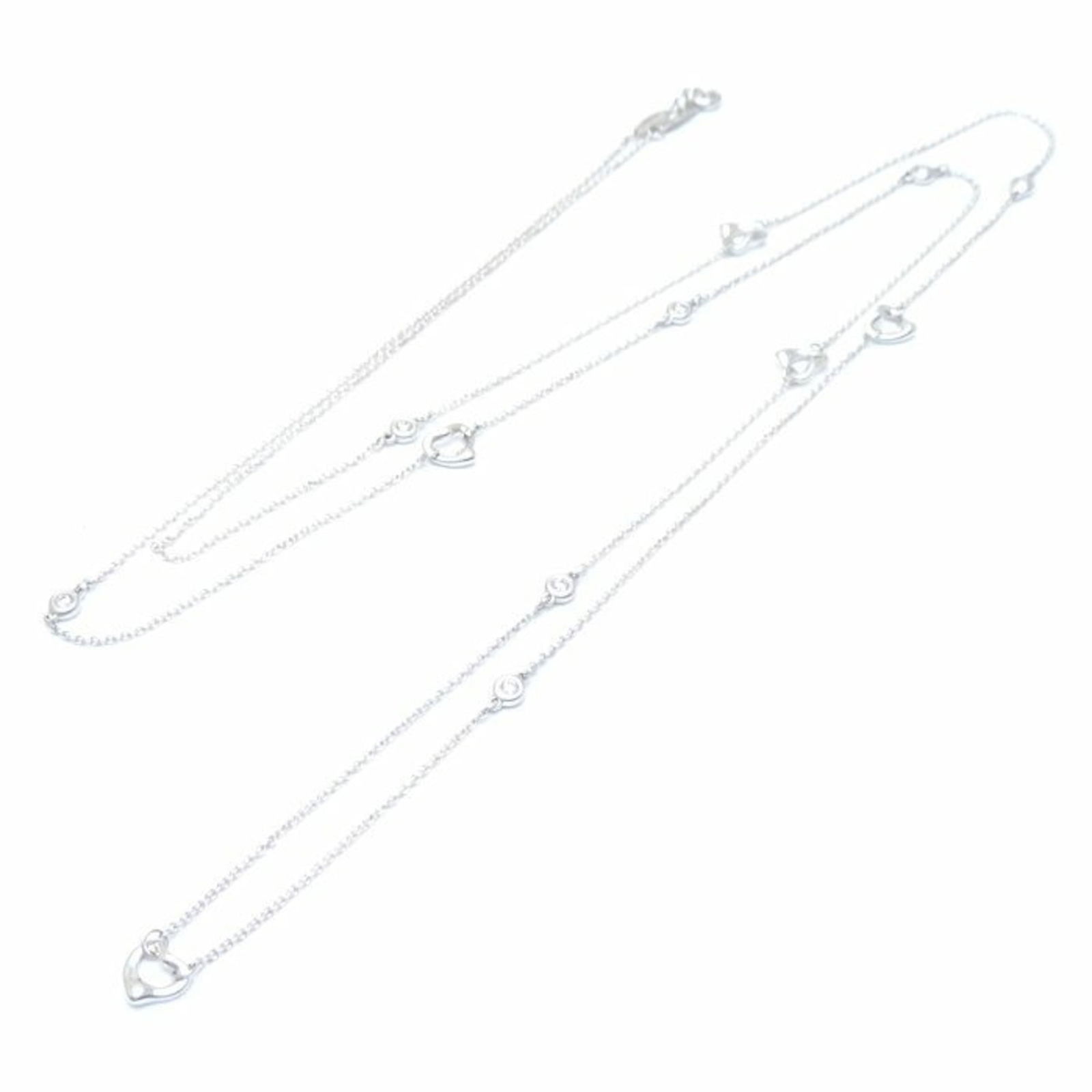 292990 TIFFANY&Co. Tiffany by the Yard Heart Necklace 7P Diamond Long Elsa Peretti Silver 925: 292990 TIFFANY&Co. Tiffany by the Yard Heart Necklace 7P Diamond Long Elsa Peretti Silver 925 This listing features 292990 TIFFANY&Co. Tiffany by the Yard Heart Necklace 7P Diamond Long Elsa Peretti