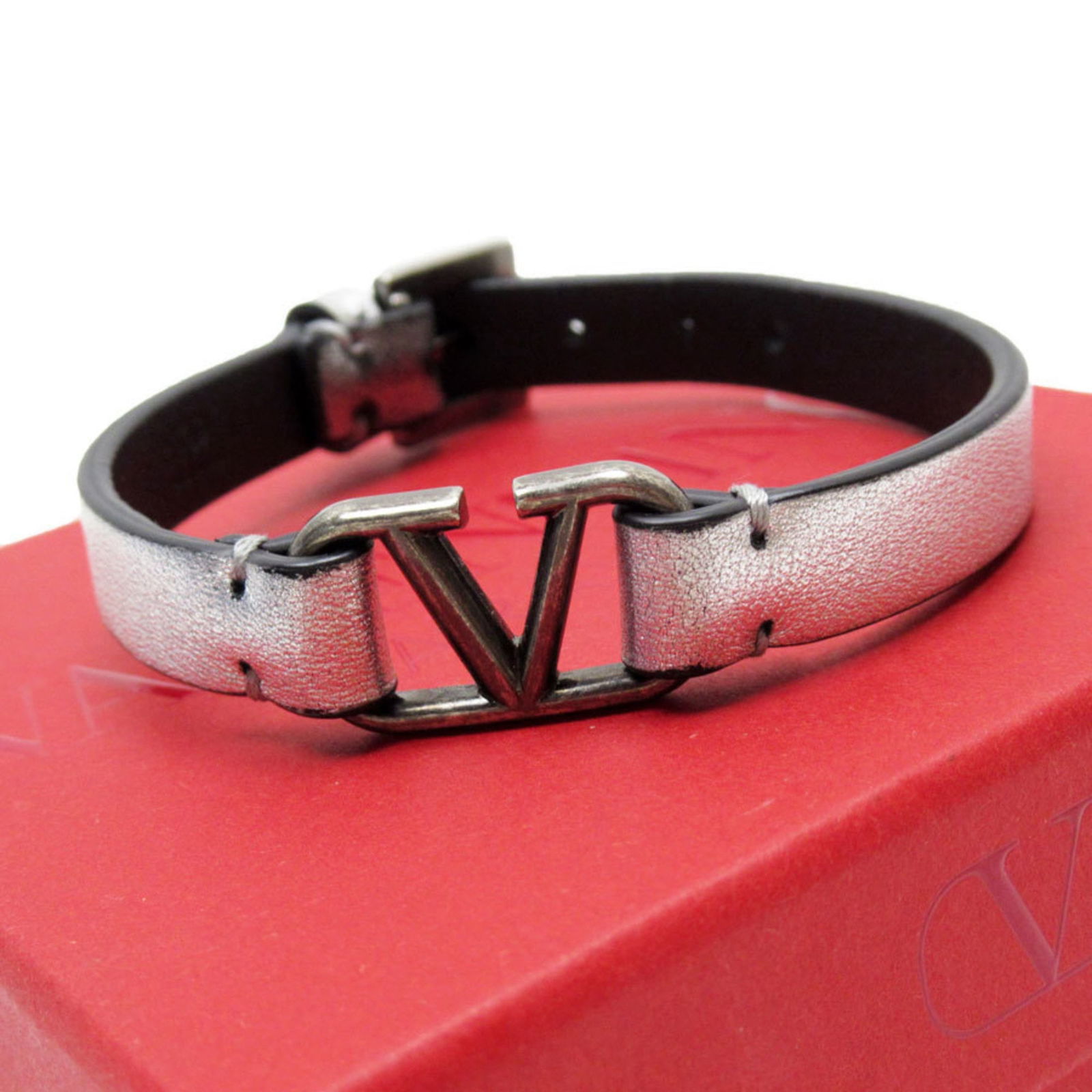 Leather Valentino Garavani Charm Bracelet: Leather Valentino Garavani Charm Bracelet This listing features Leather Valentino Garavani Charm Bracelet. Item specifics are provided below. Item Specifics: Brand: Valentino Garavani Type: Charm