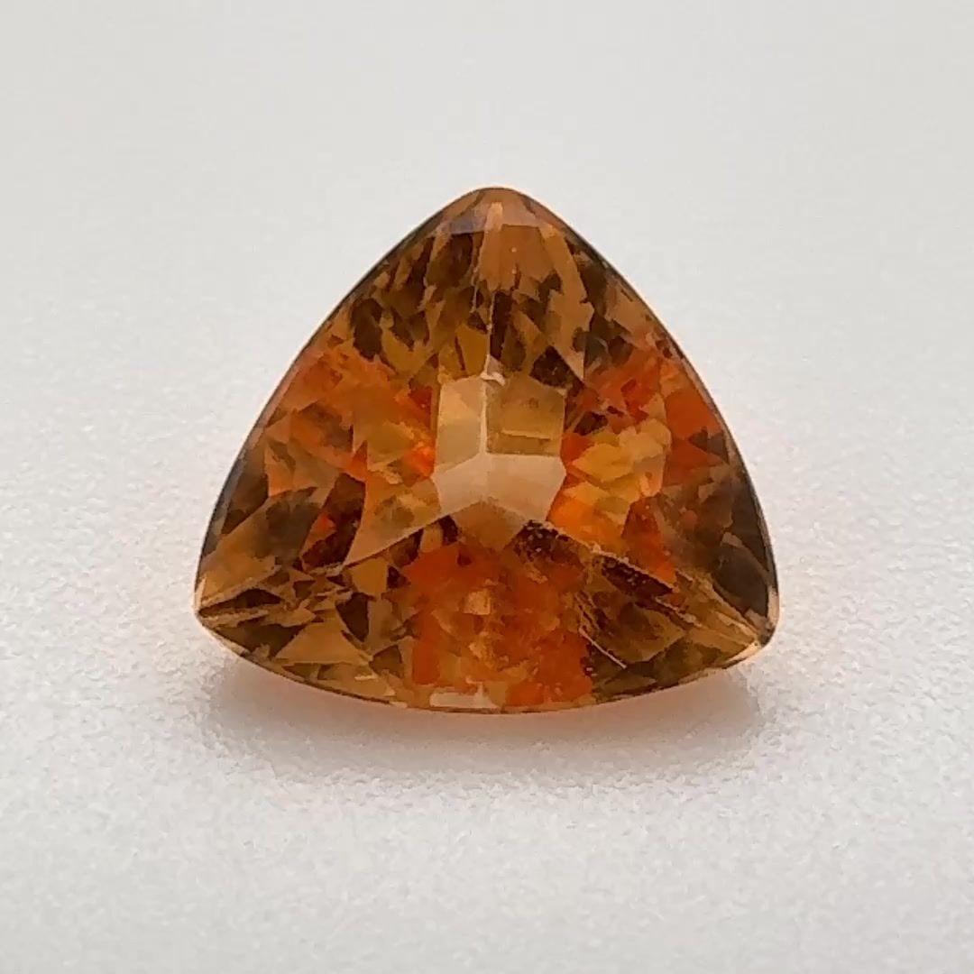 Loose Topaz Gemstone - Trilliant 1.645ct Orange EC: Loose Topaz Gemstone - Trilliant 1.645ct Orange EC This listing features Loose Topaz Gemstone - Trilliant 1.645ct Orange EC. Item specifics are provided below. Item Specifics: Type: Topaz Carat: