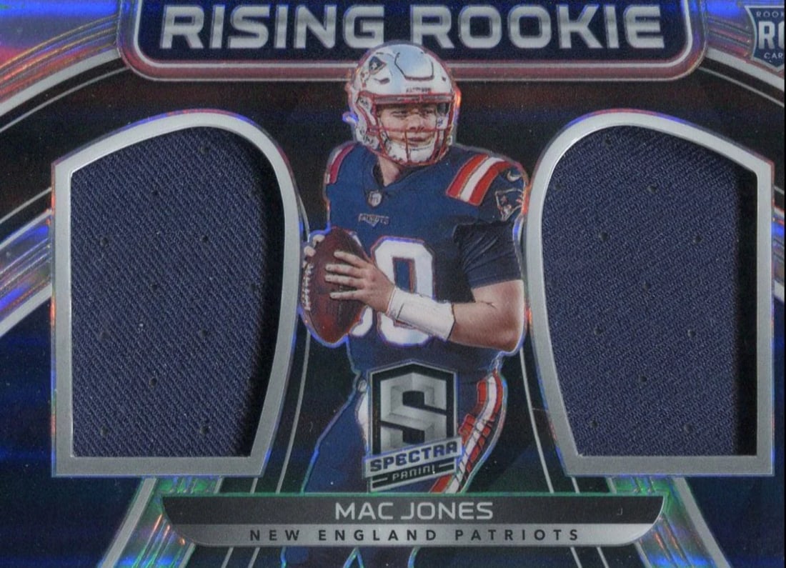 99 Mac Jones 2021 Panini Spectra Rookie Memorabilia Card #71/ (1 of 2)