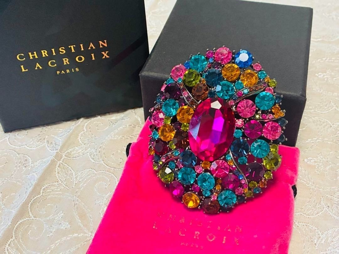 Rare Christian Lacroix Pink and Multicolored Crystal Pin Brooch in: Rare Christian Lacroix Pink and Multicolored Crystal Pin Brooch in This listing features Rare Christian Lacroix Pink and Multicolored Crystal Pin Brooch in. Item specifics are provided below. Item